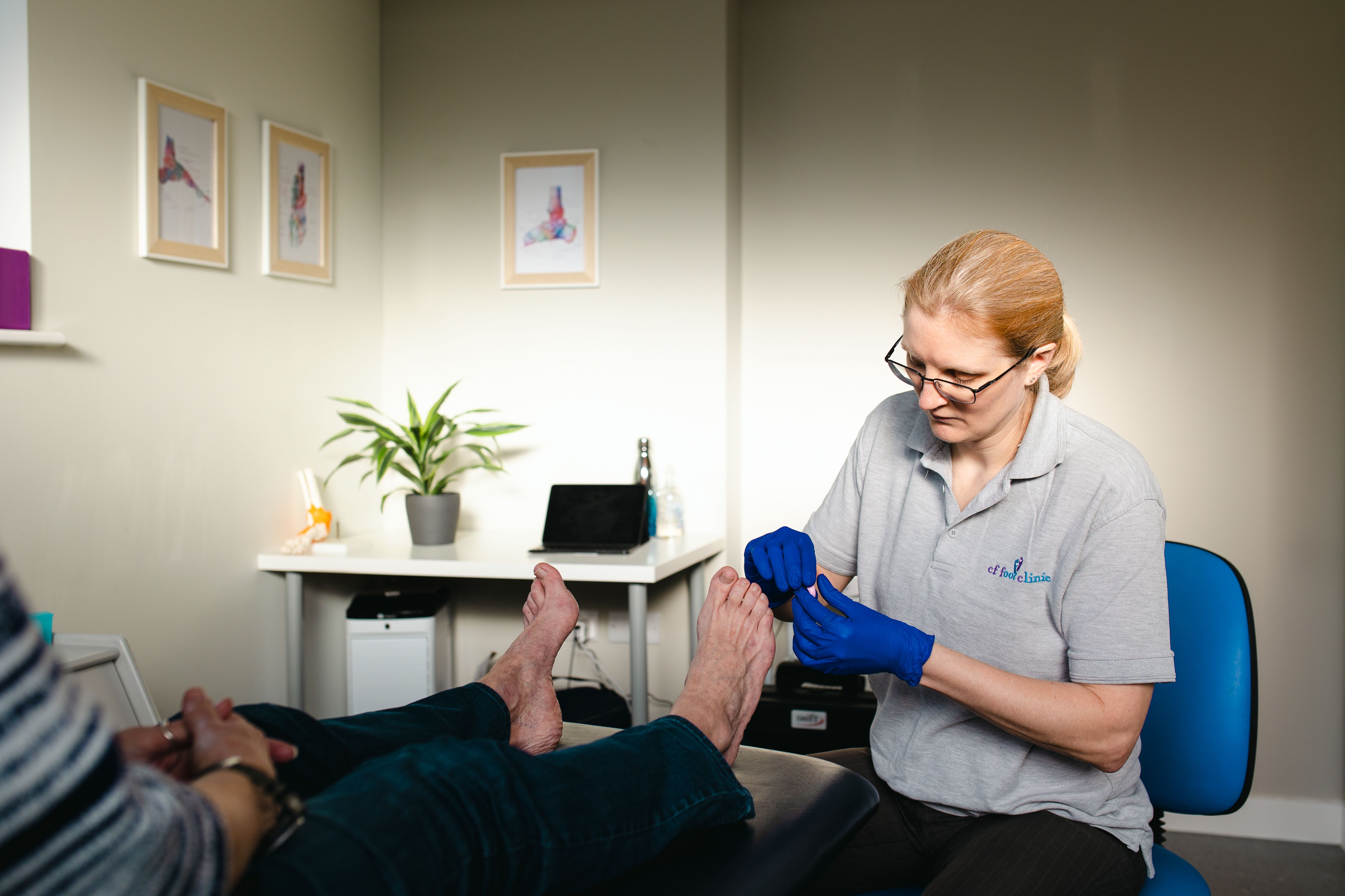 Podiatrist Catherine Fletcher-Liddell treating a patient