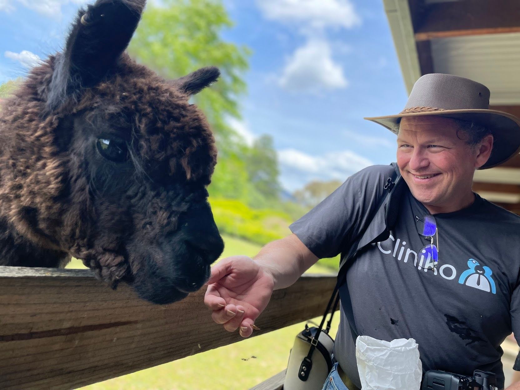 Bill pictured feeding an alpaca
