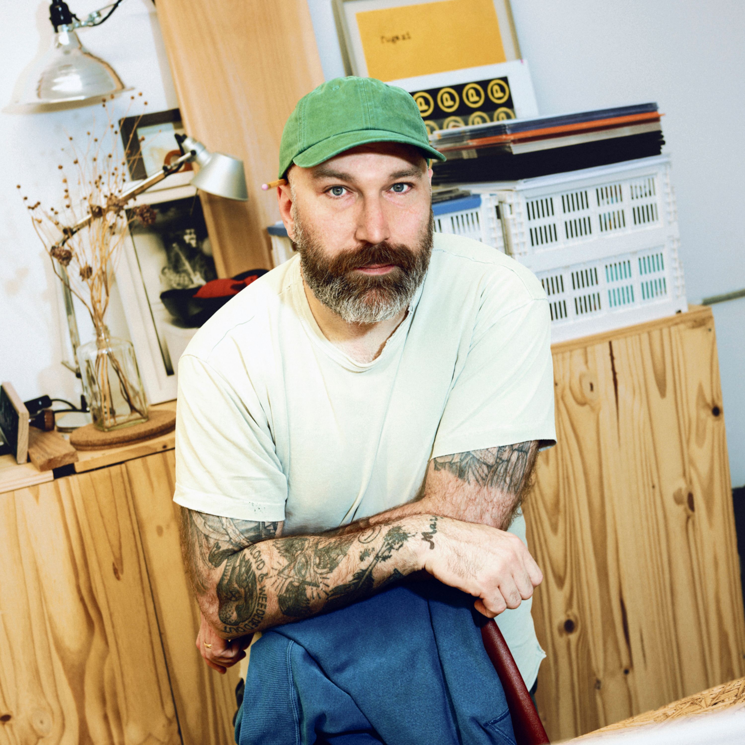 Portrait of Jordan Butcher in his office in Hudson, New York