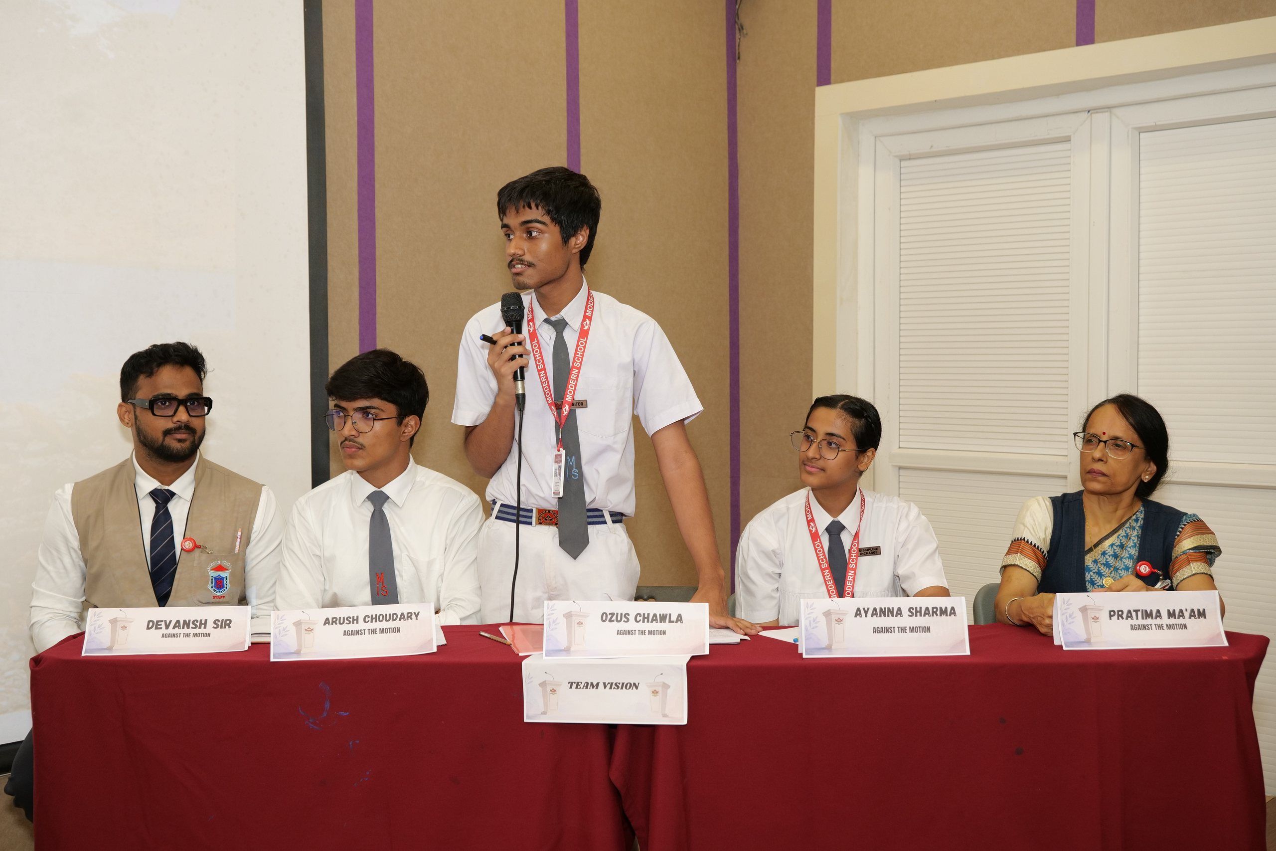A student speaking at the Inter-House Debate