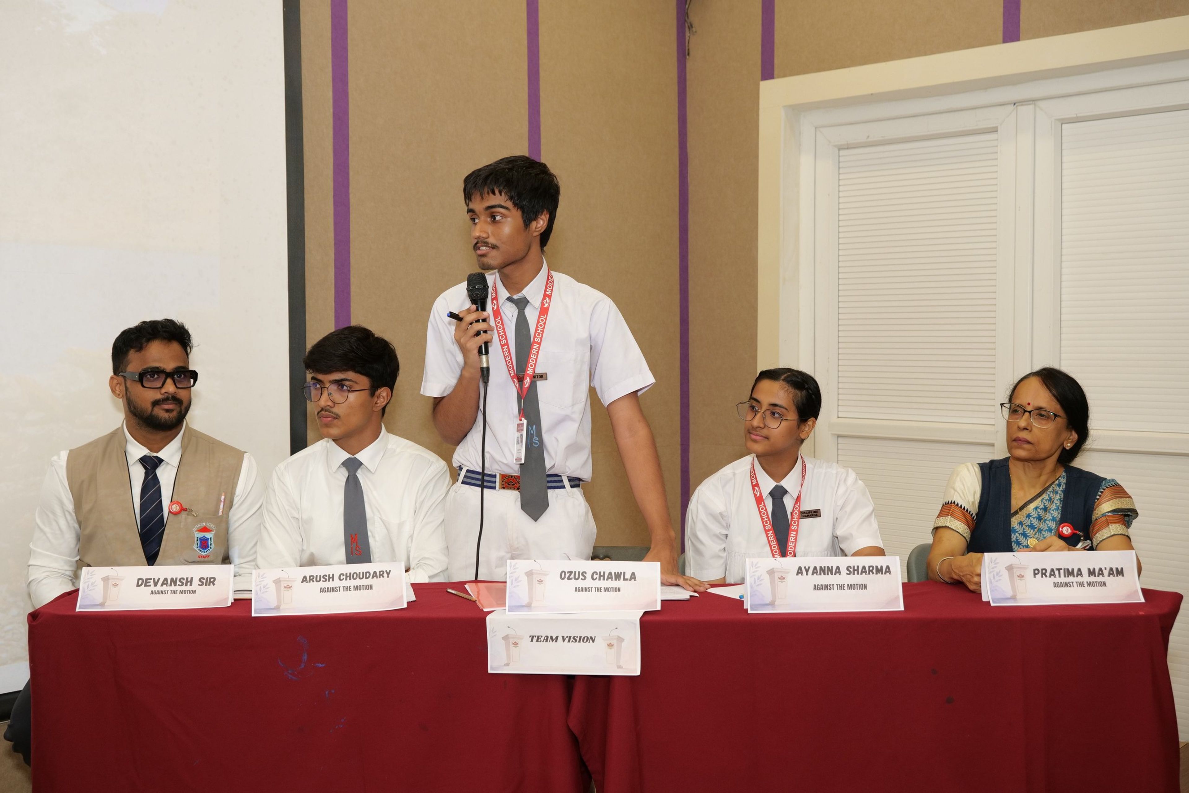 A student speaking at the Inter-House Debate
