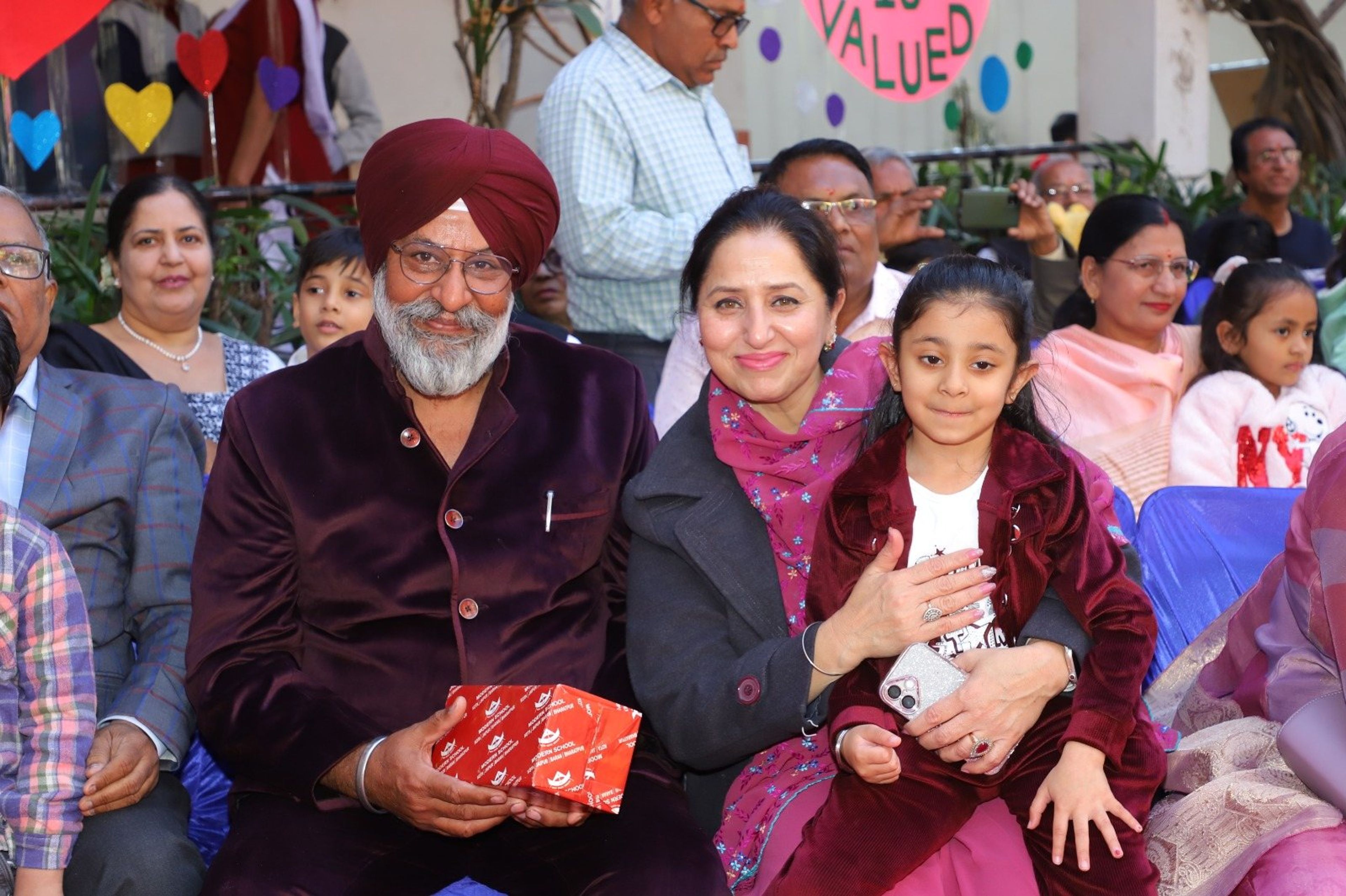 A family together at the Grandparents' Day celebration