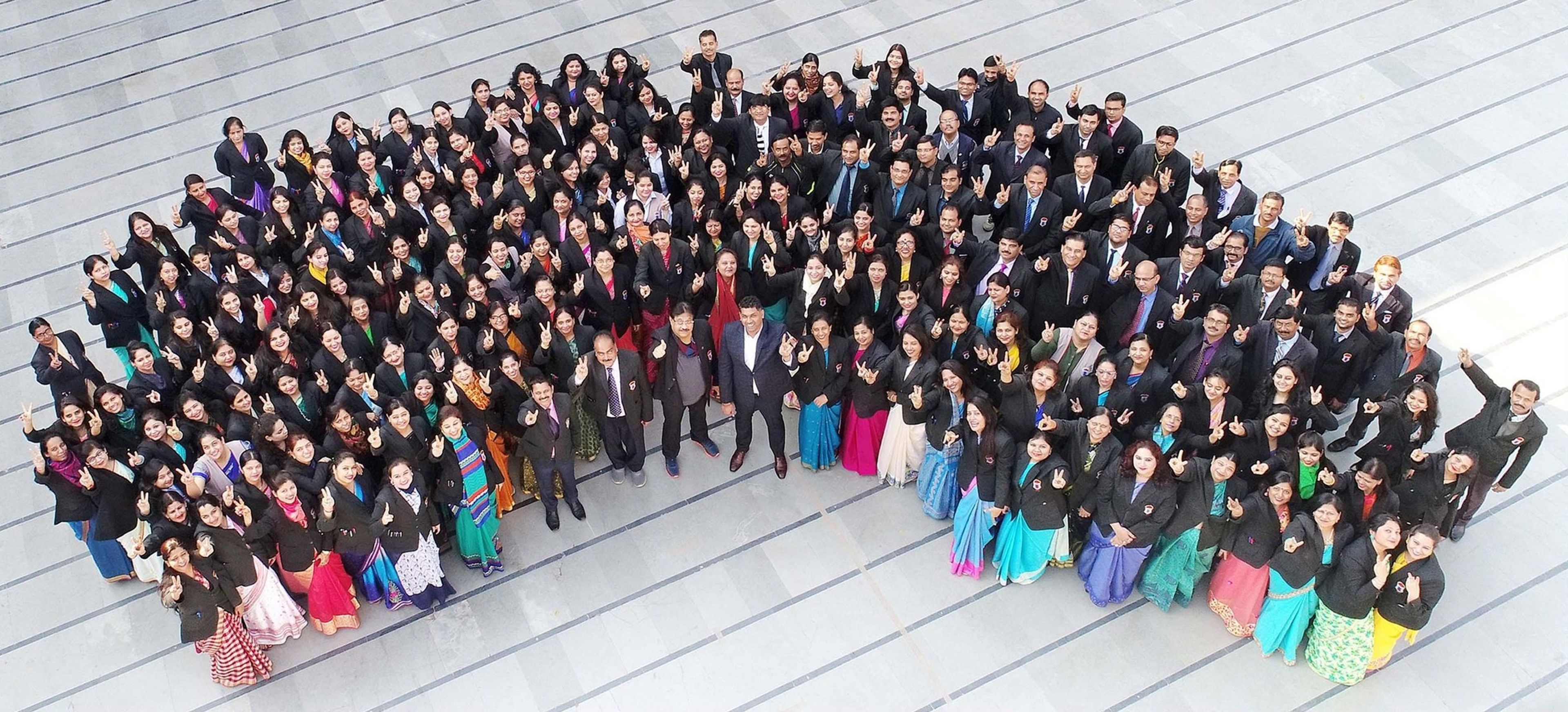 The school's teaching staff gathered for a group photo