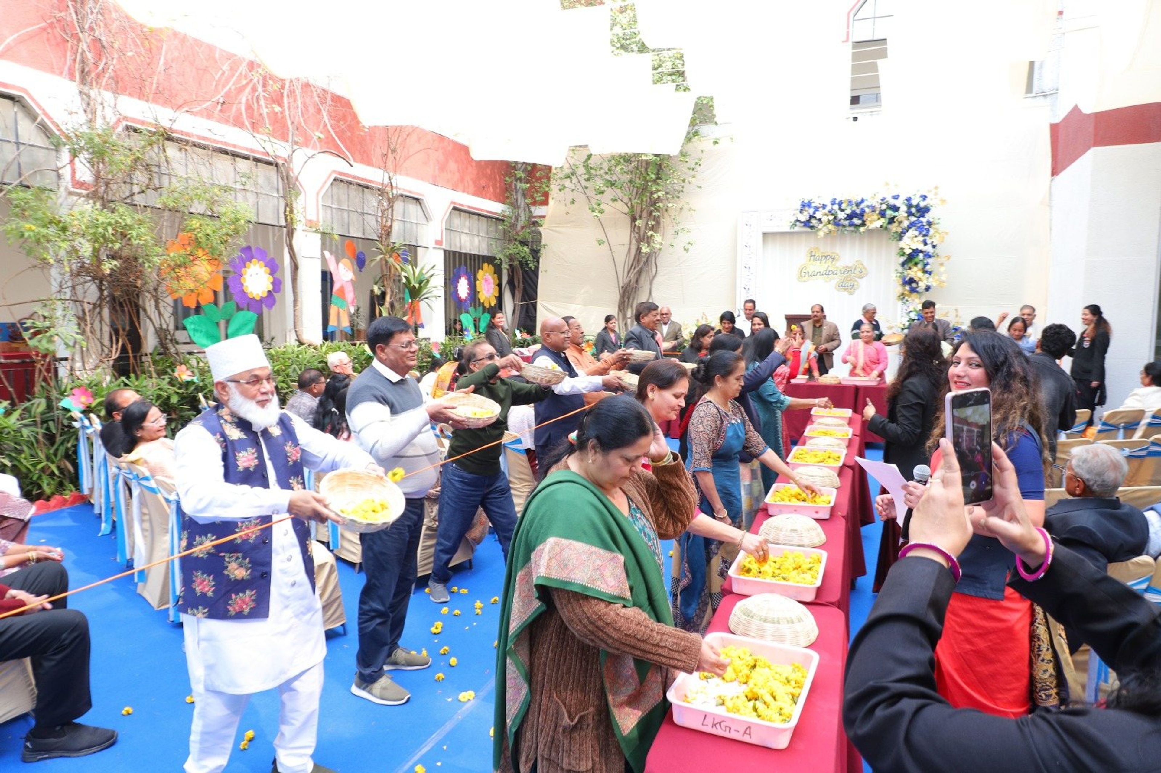 Grandparents joining in a game at the celebration