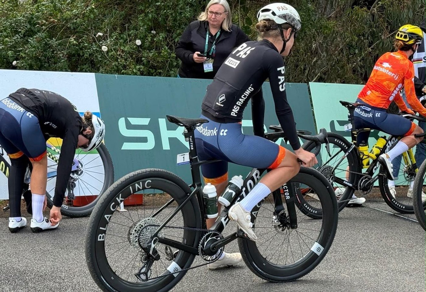 A Factor gravel bike on Black Inc wheels at the start line, before the race