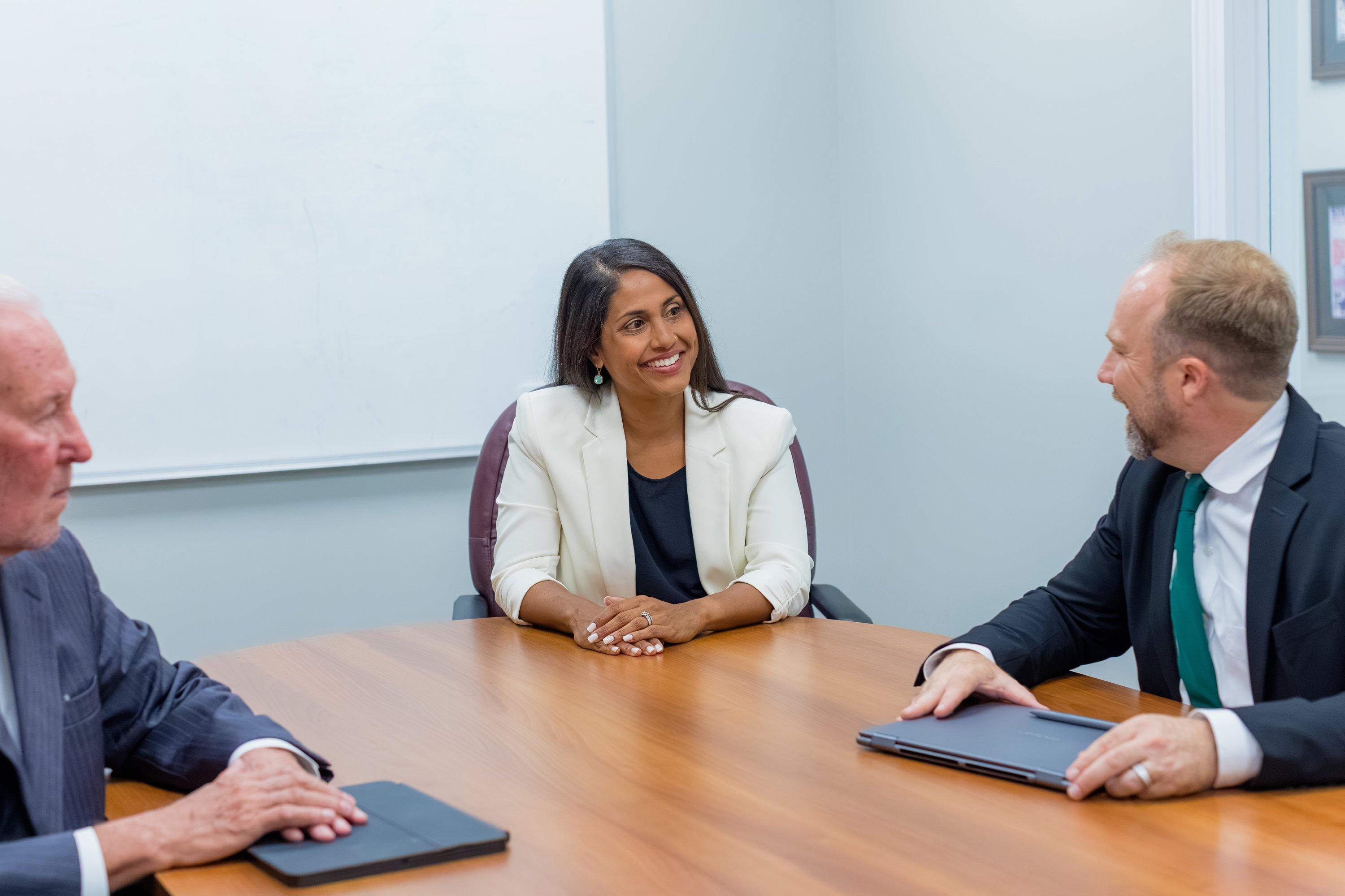 Joseph M. Harvath meeting with clients