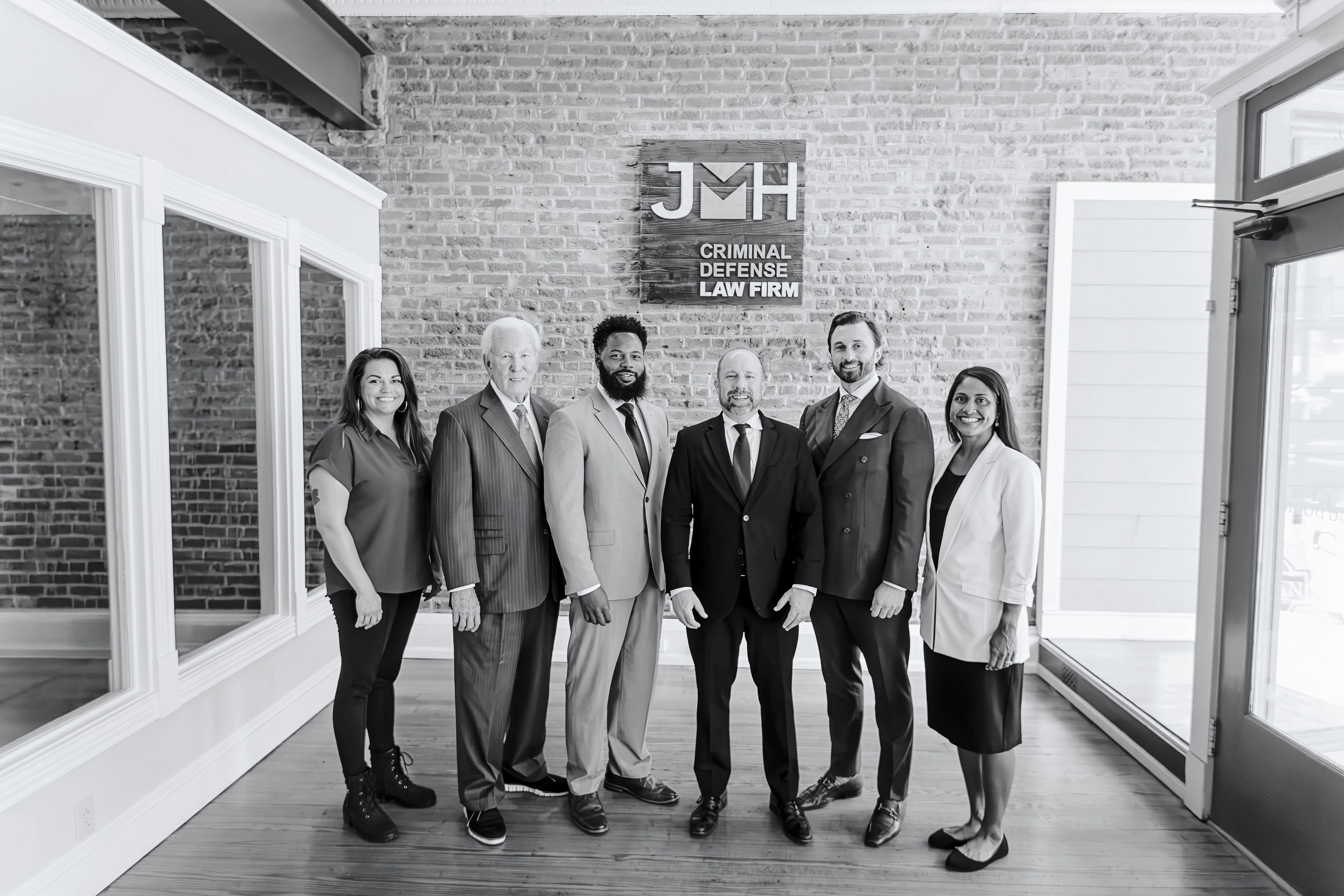 The JMH Law Firm team at the office