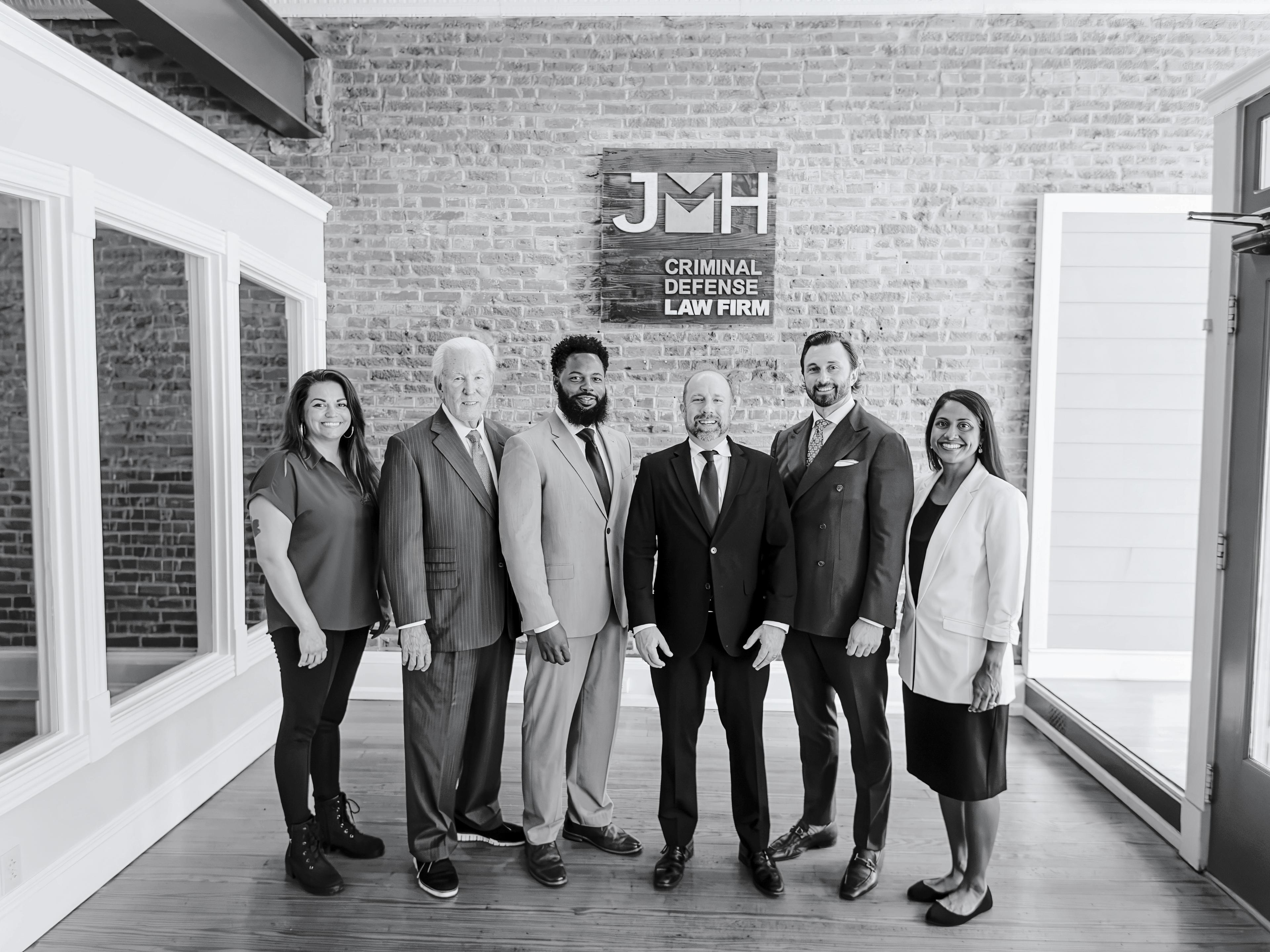 The JMH Law Firm team at the office