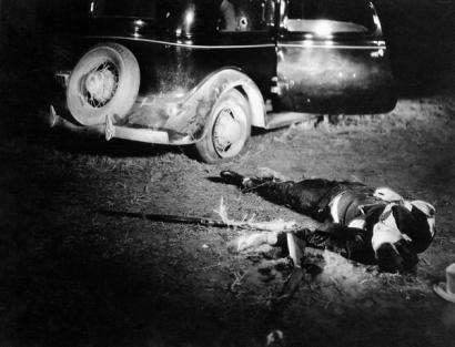 image from Crime scene photo of Blackie Thompson, who was gunned down in 1933 after he had escaped from prison.