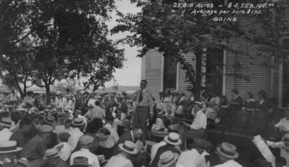 image from Colonel Walters and oilmen gather for an auction under the Million Dollar Elm.