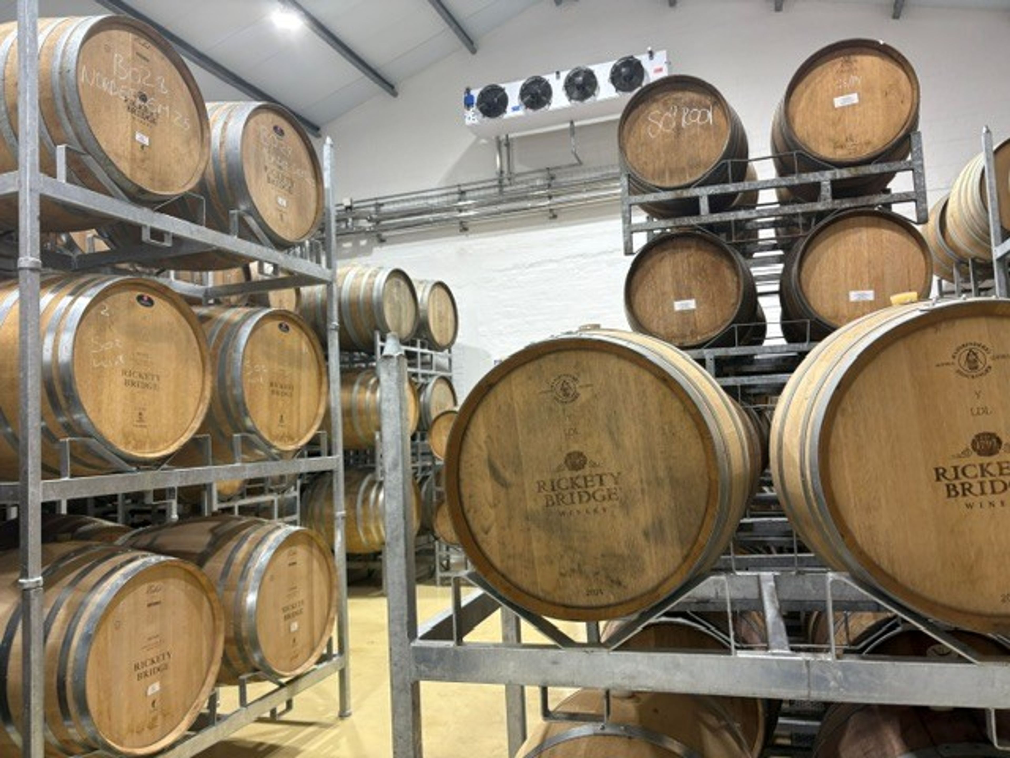 Wine barrels in the Rickety Bridge cellar