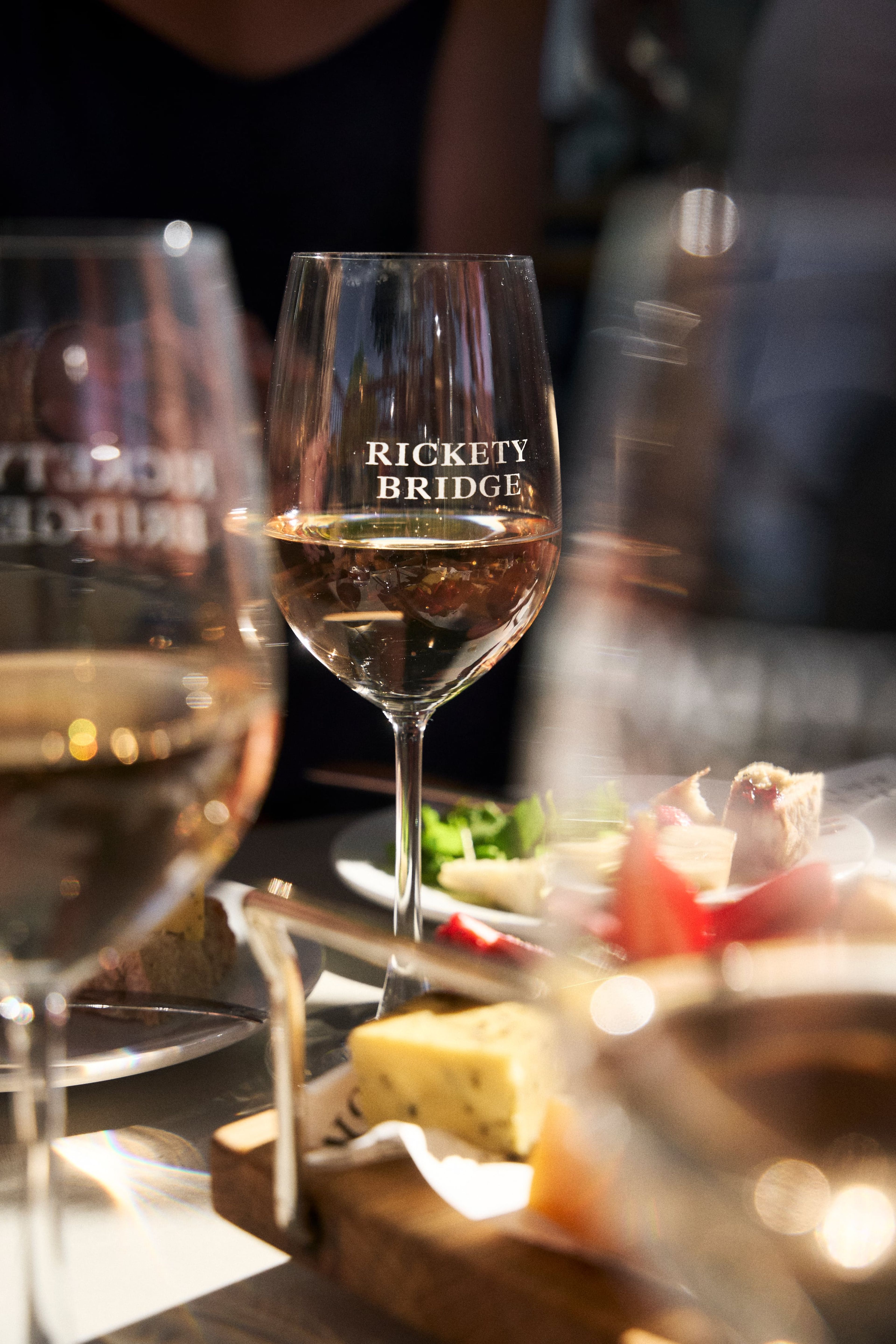 A glass of rosé in a Rickety Bridge glass