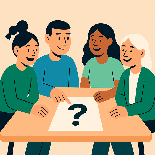 En gruppe mennesker sitter rundt et bord med et spørsmålstegn på et ark.