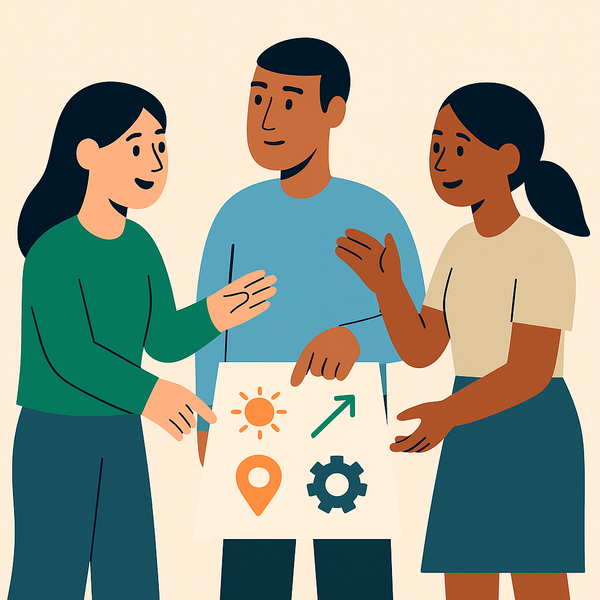 En gruppe mennesker ser på et ark med ikoner på.