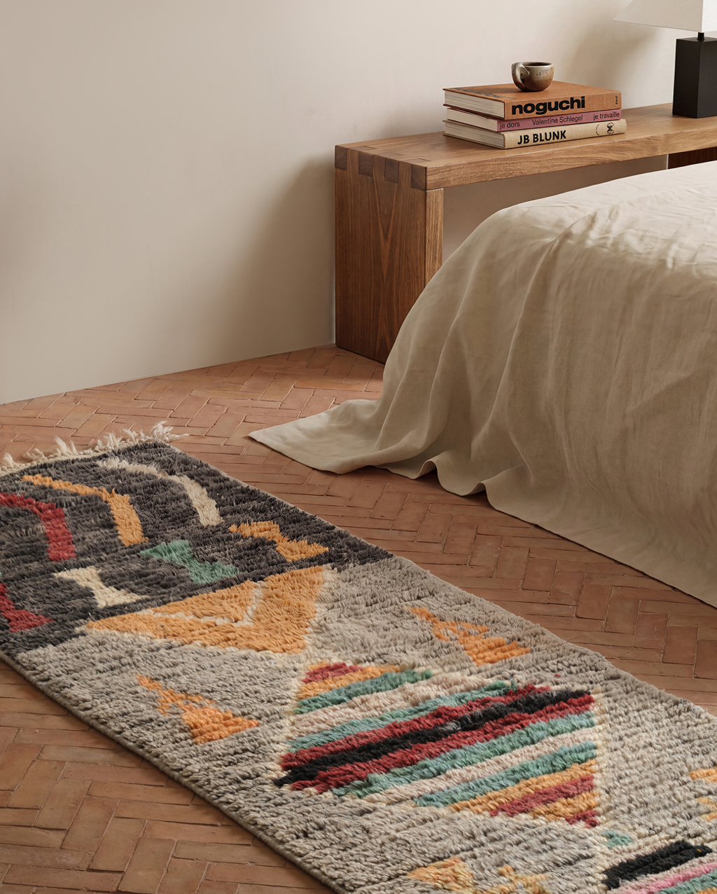 A living room with a beautiful rug