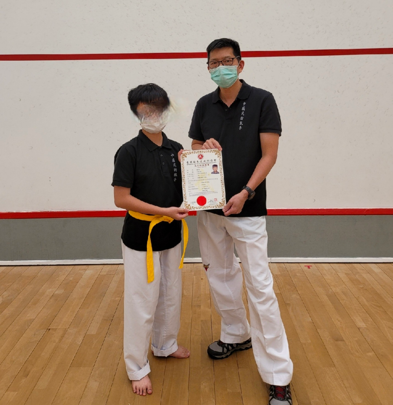 student of level 2 with coach and certificate