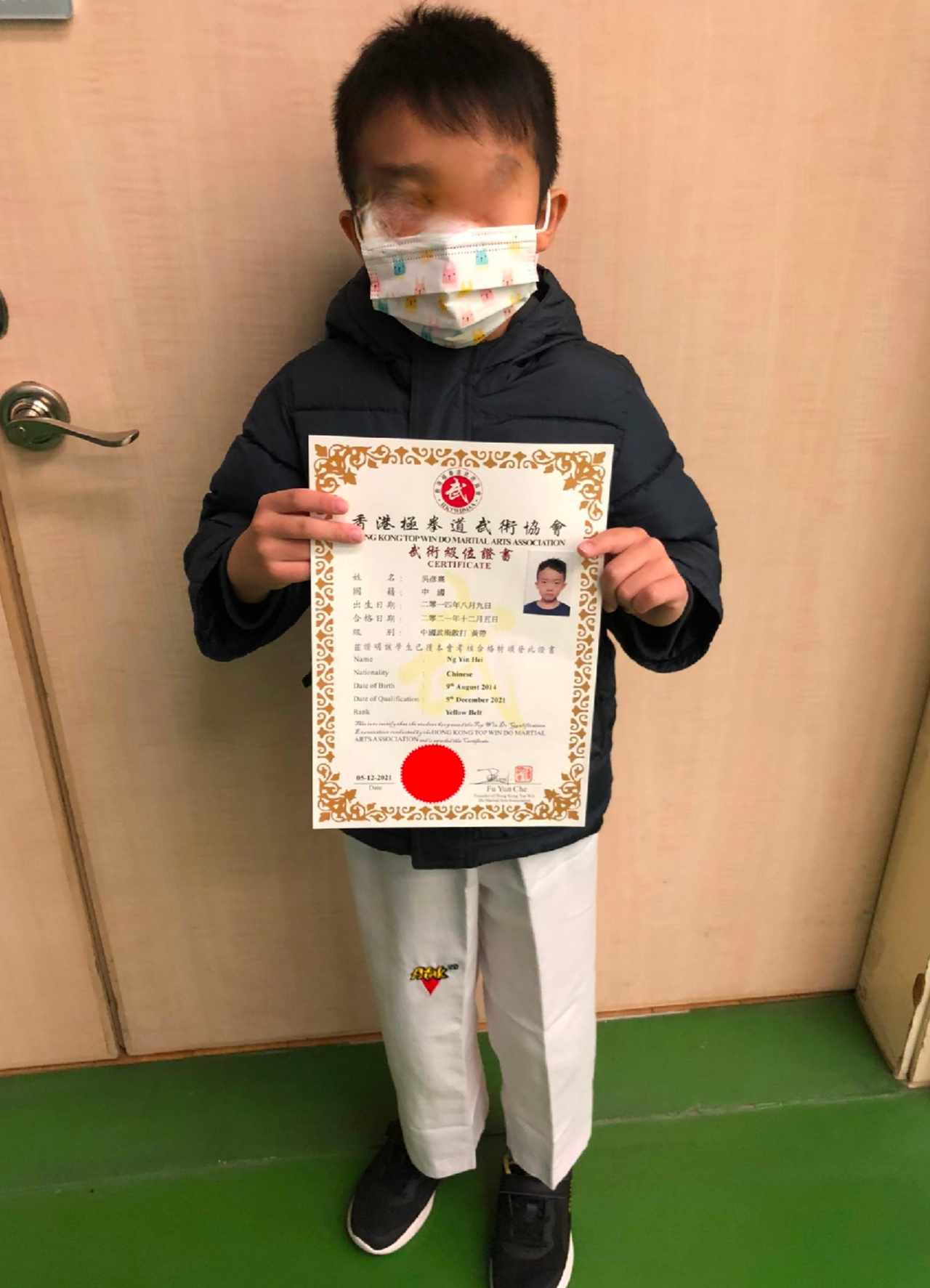 Student with certificate