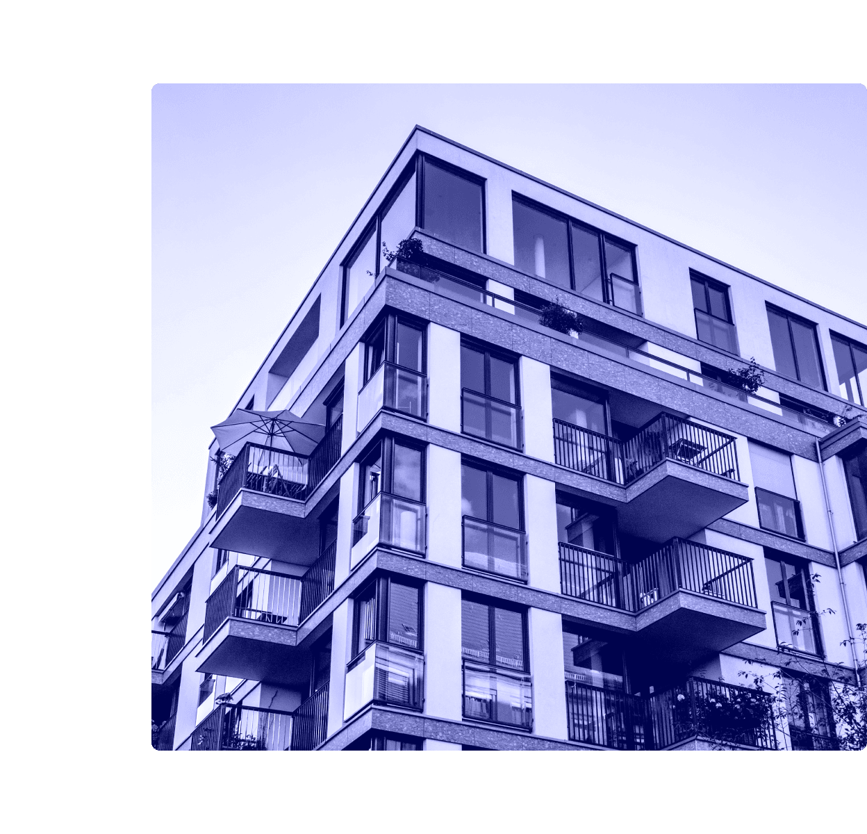 A purple-toned photo of a modern multi-story apartment building with balconies, used on a property management work order software page.