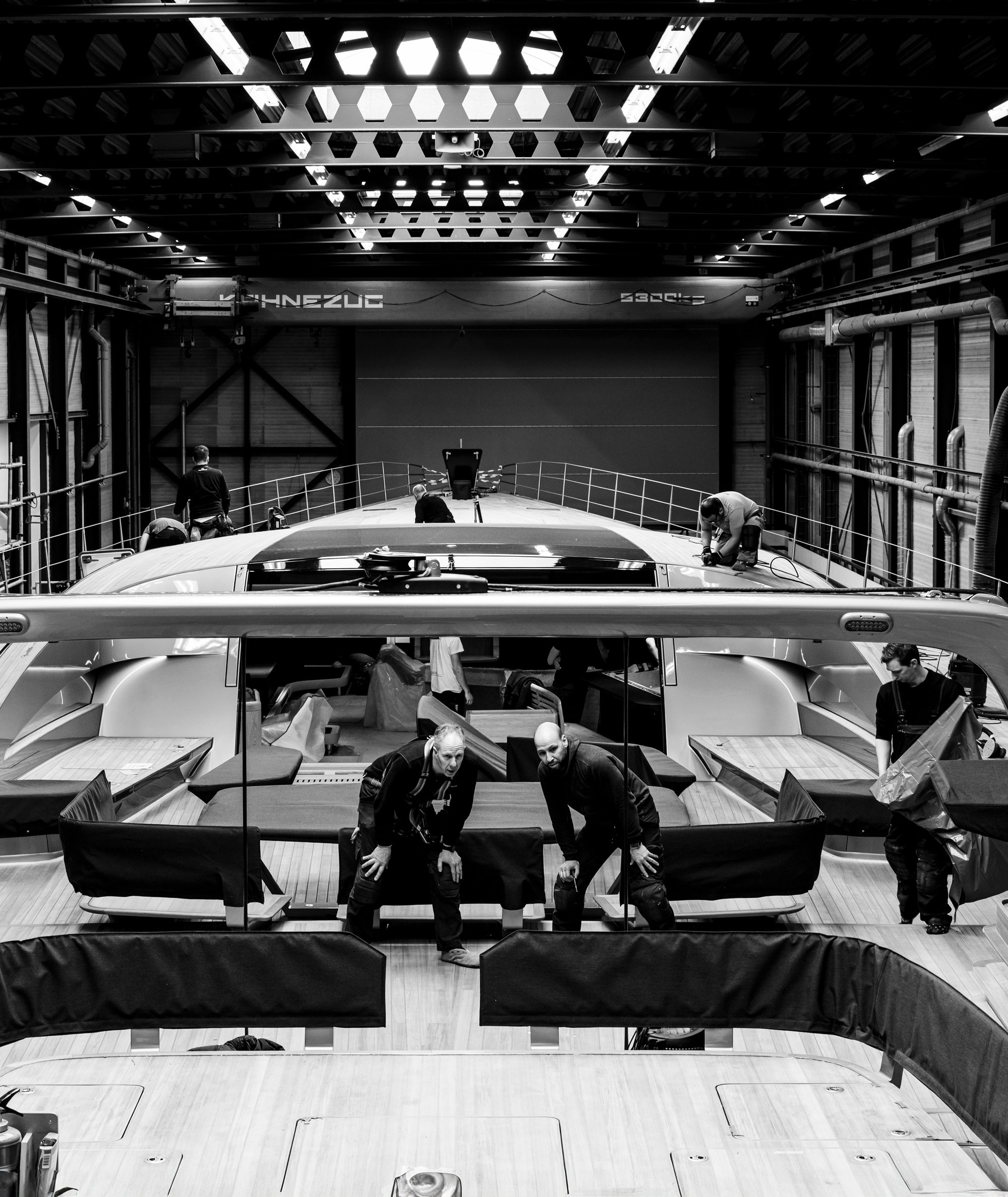 The teams are busy ensuring the successful completion of the yacht project.