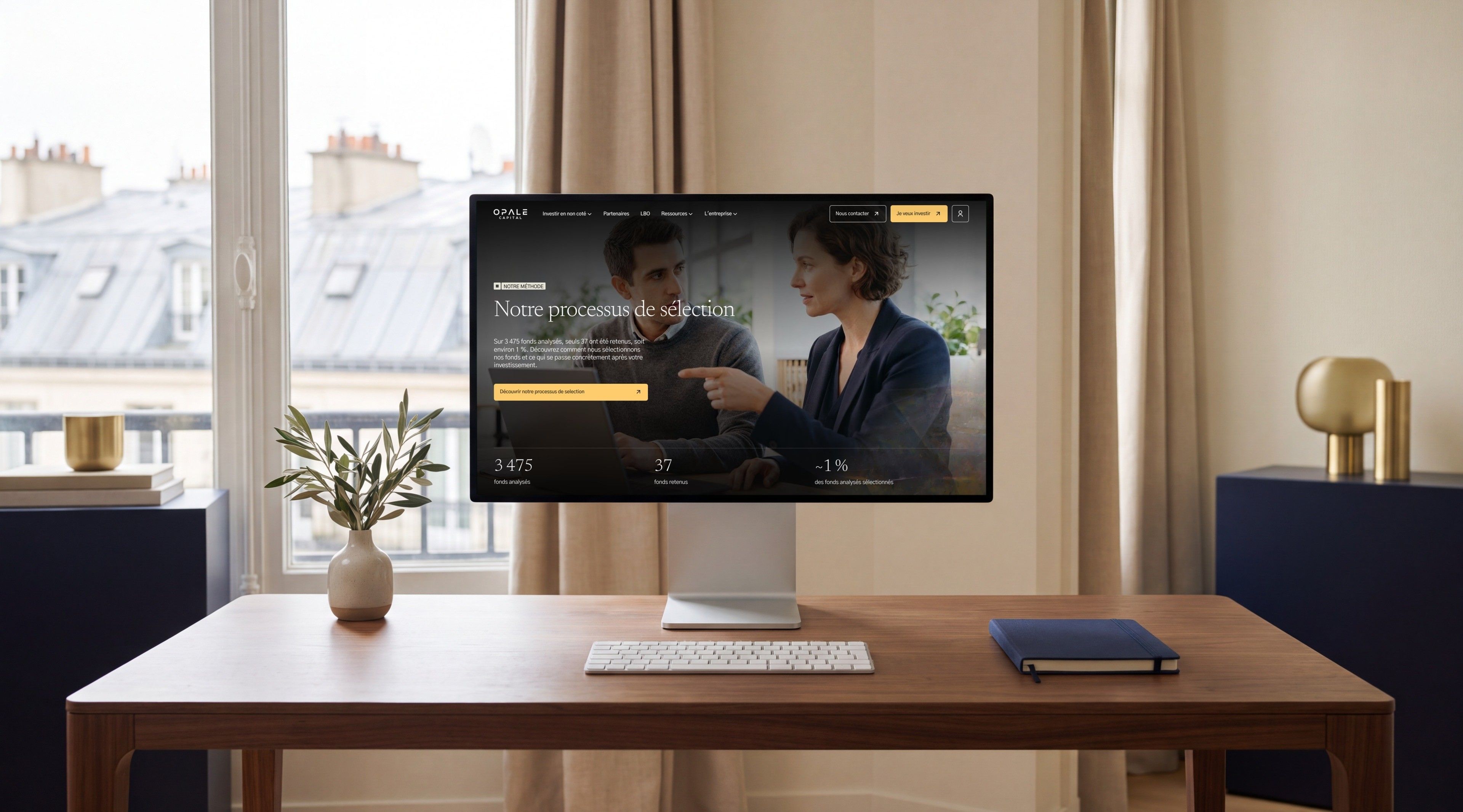 Pro Display XDR open on Opale Capital's “Our selection process” page, in front of the Paris rooftops