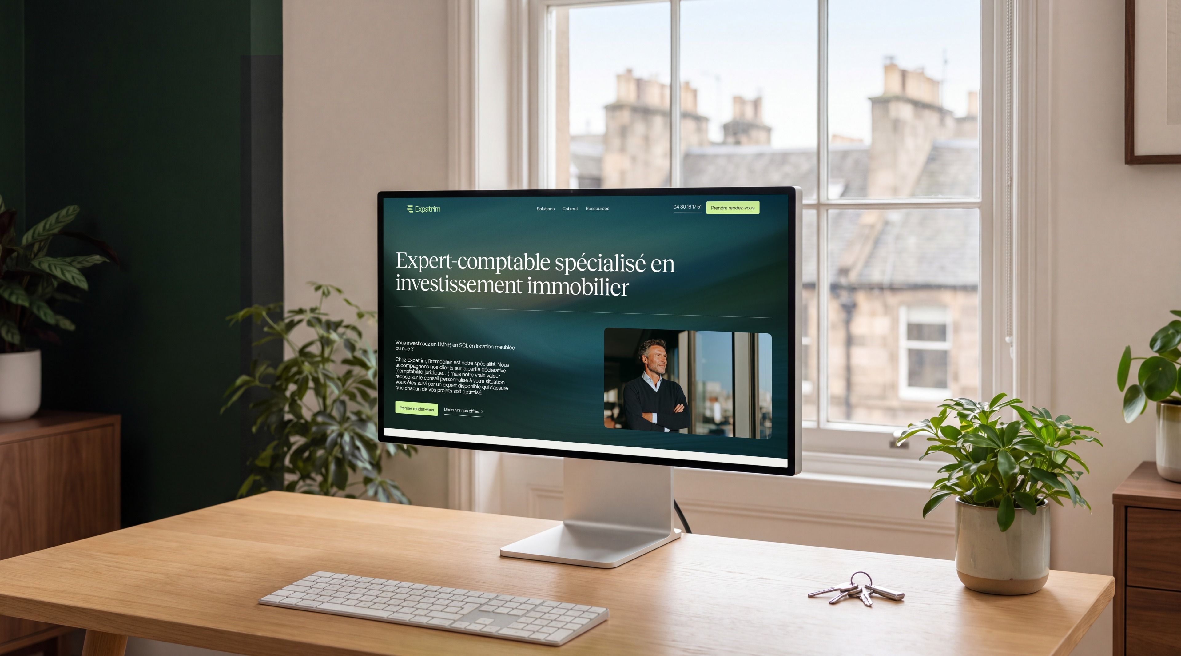 Pro Display XDR open on Expatrim's “Accountant specialised in real estate investment” page