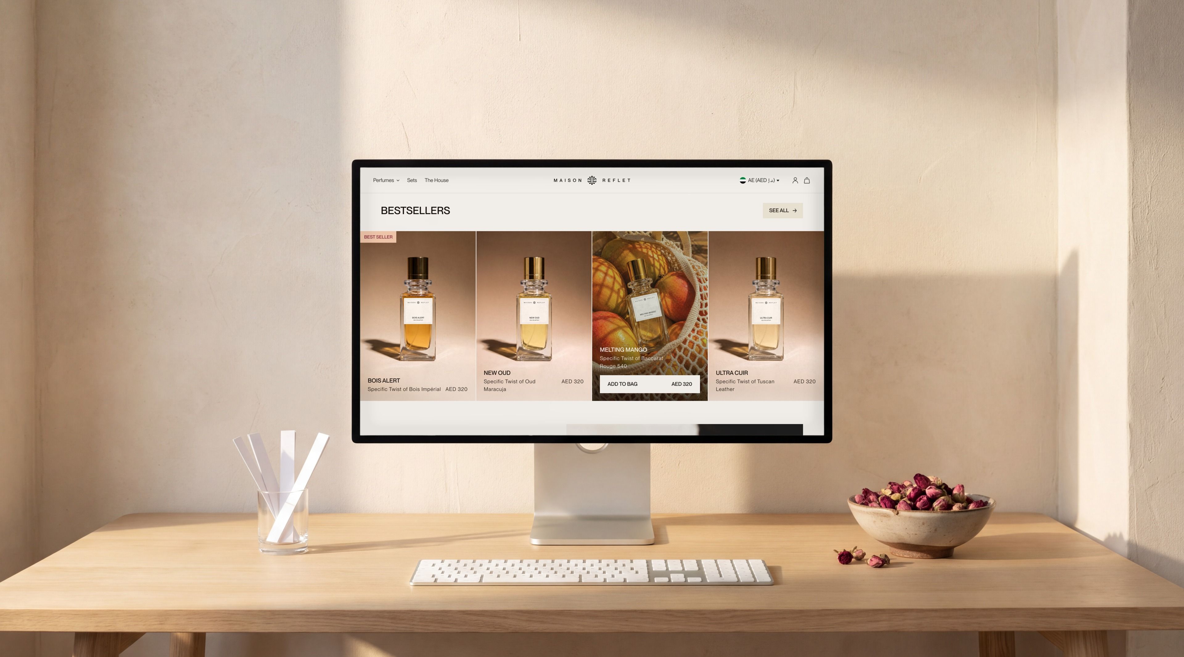 Pro Display XDR open on the Maison Reflet home page, Bestsellers section, with the Melting Mango card hovered