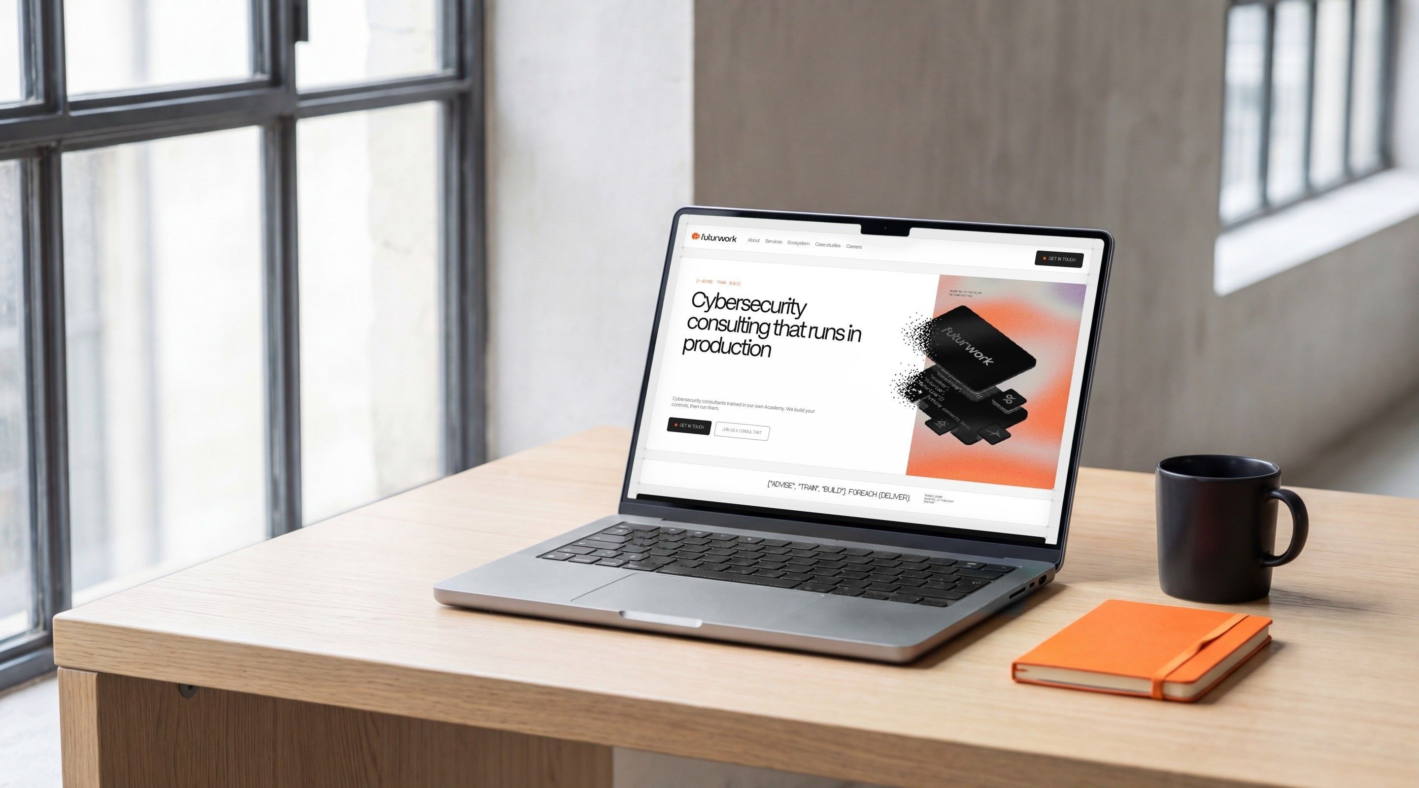 MacBook Pro open on the Futurwork home page, “Cybersecurity consulting that runs in production”