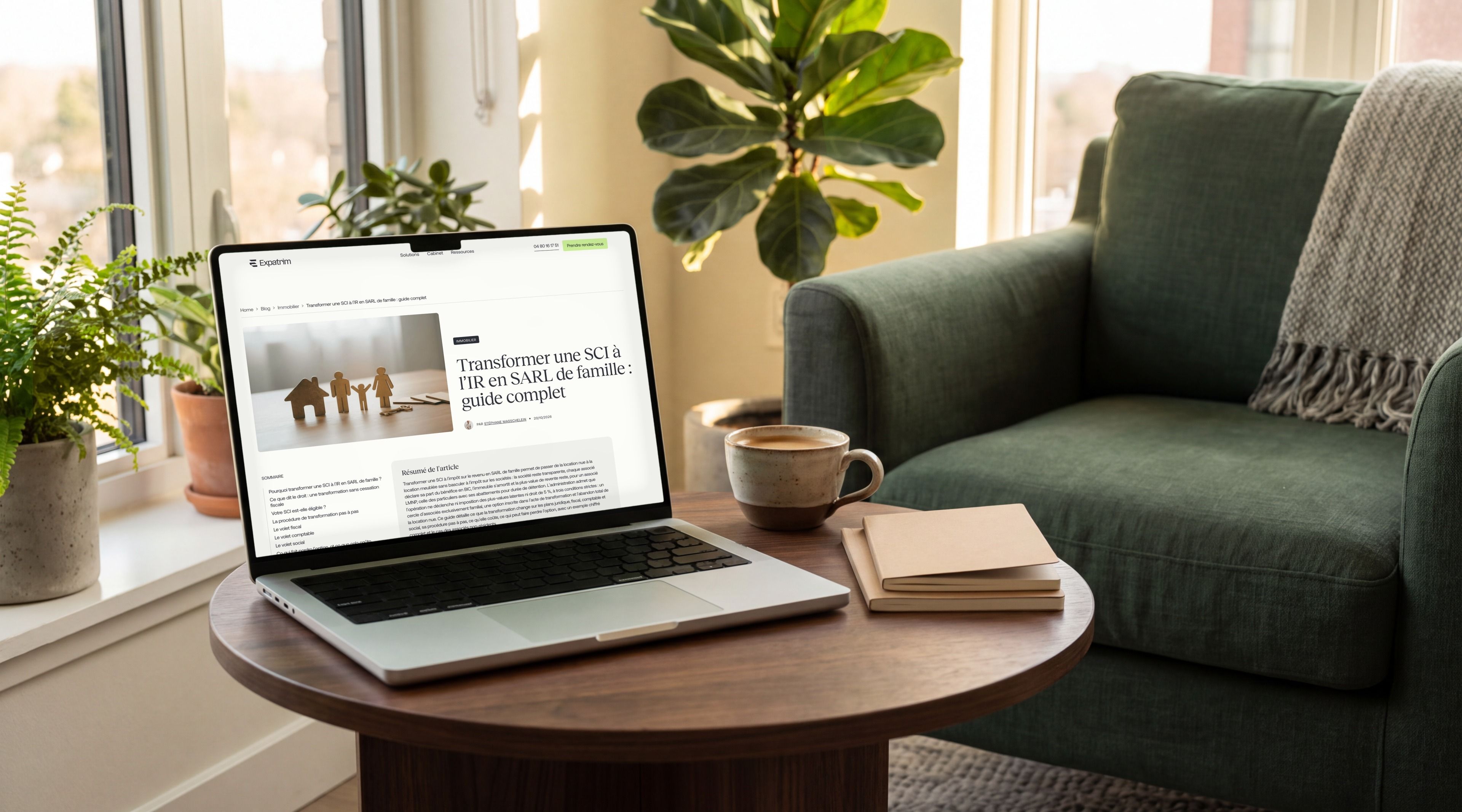 MacBook Pro open on the Expatrim article “Converting an income-tax SCI into a family SARL: complete guide”