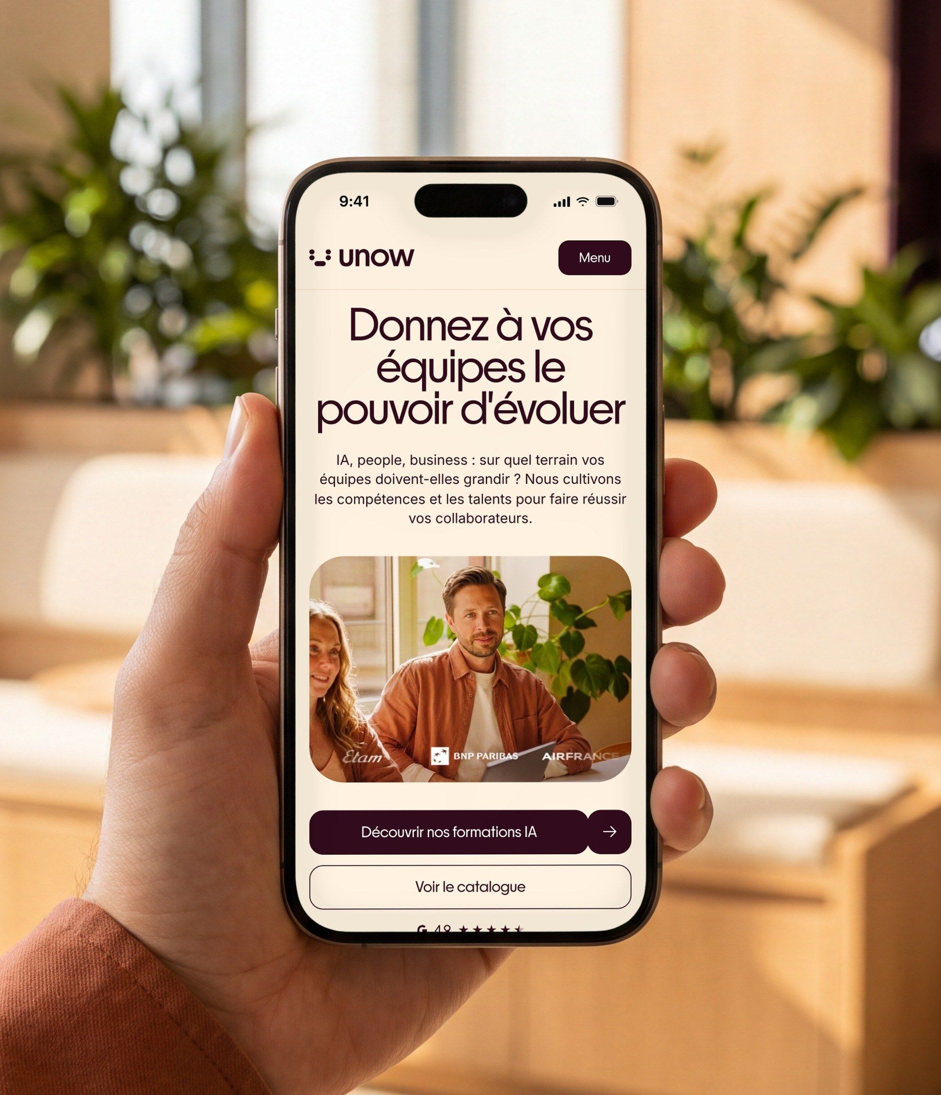 iPhone 16 Pro open on the Unow mobile home page