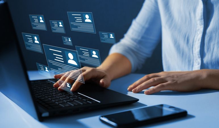A photo of someone using a laptop