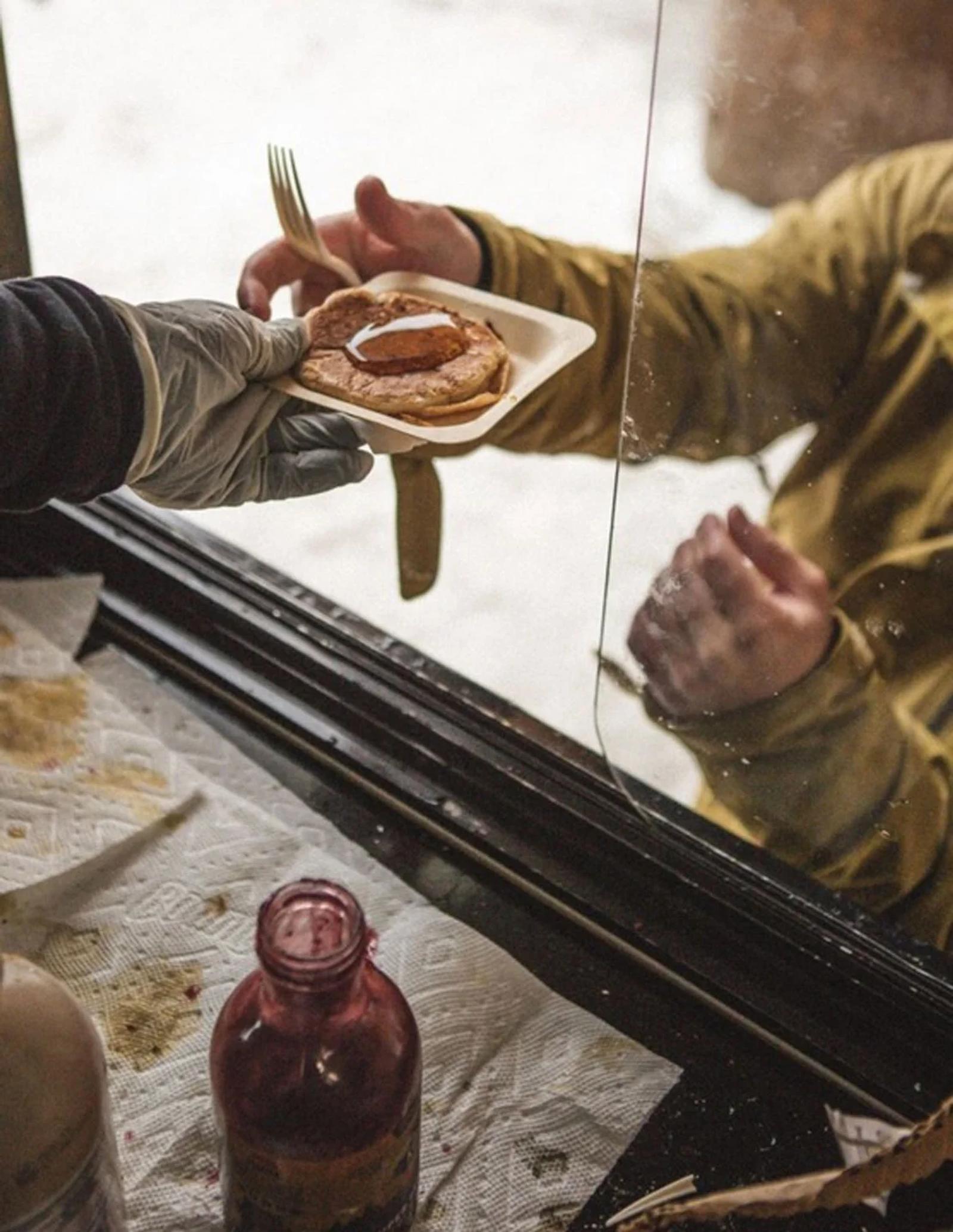 giving food at an experiential marketing event