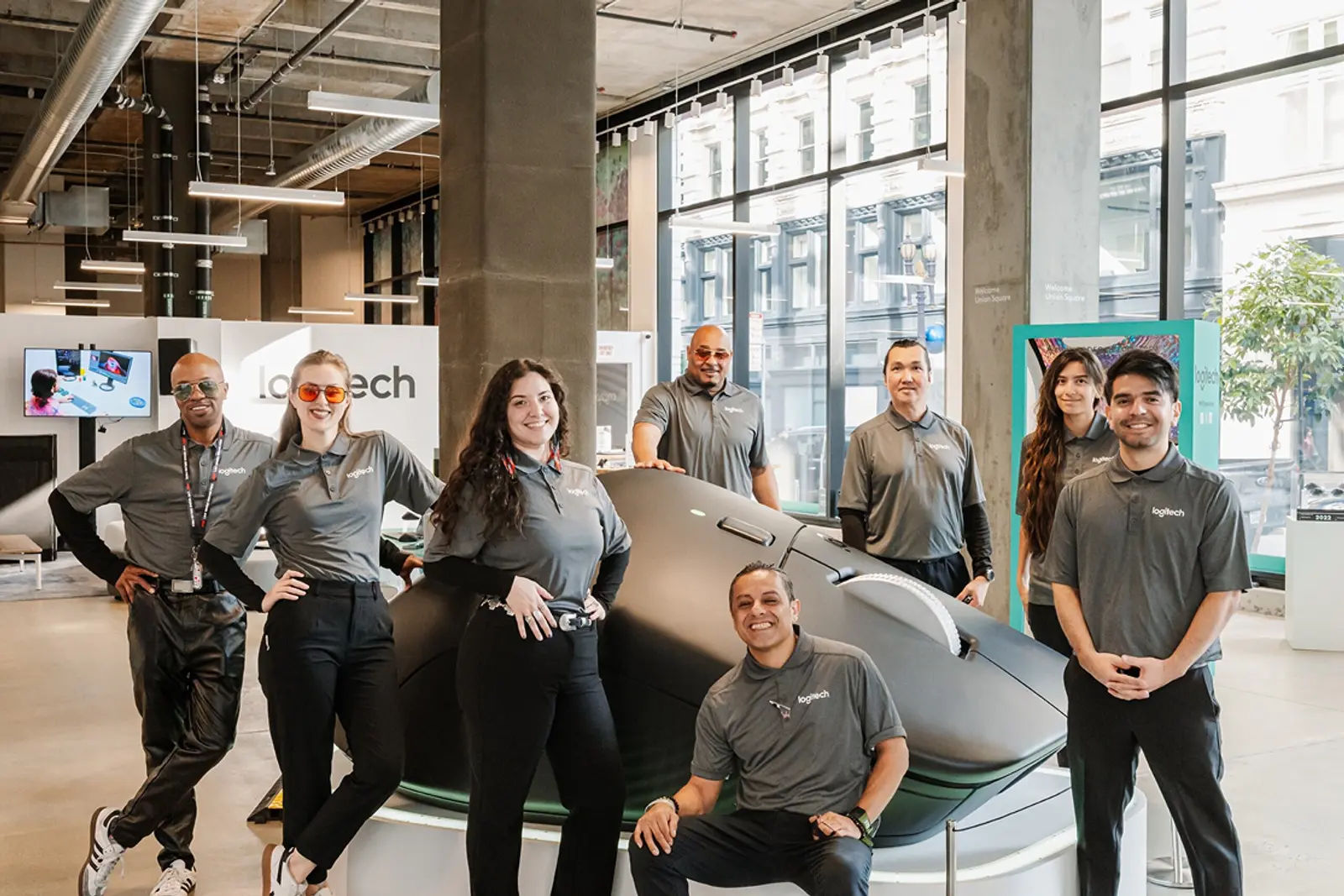 Image of an experiential marketing staffing team posing inside a branded retail activation space
