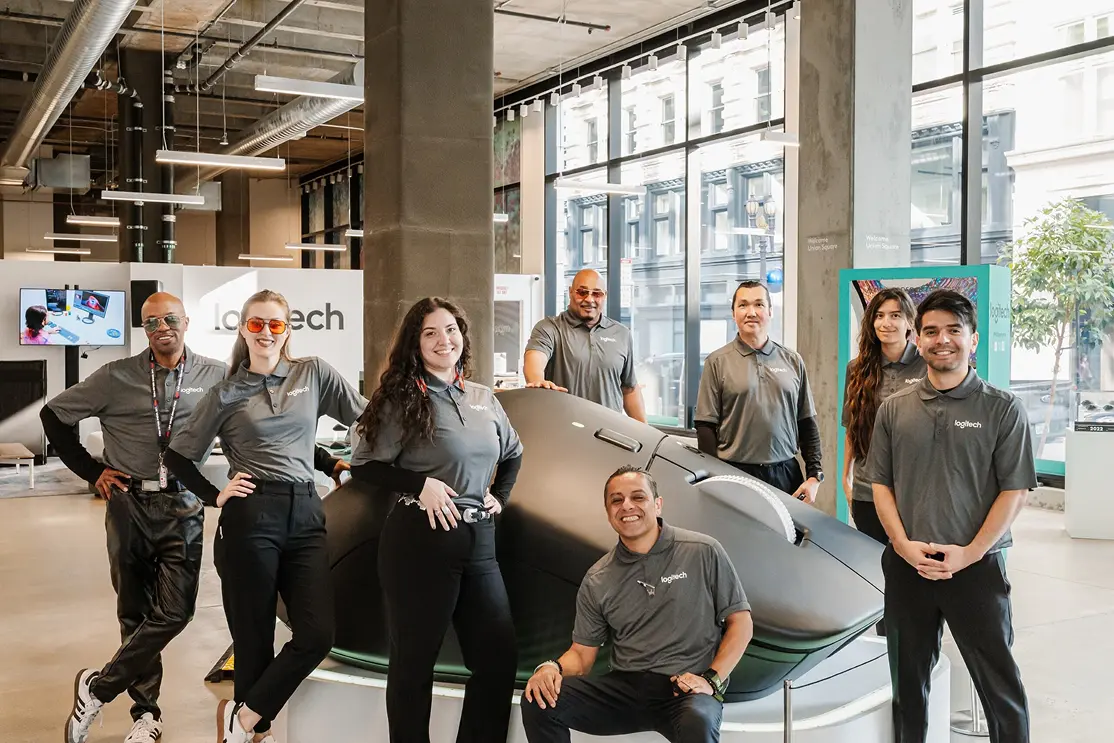 Image of an experiential marketing staffing team posing inside a branded retail activation space
