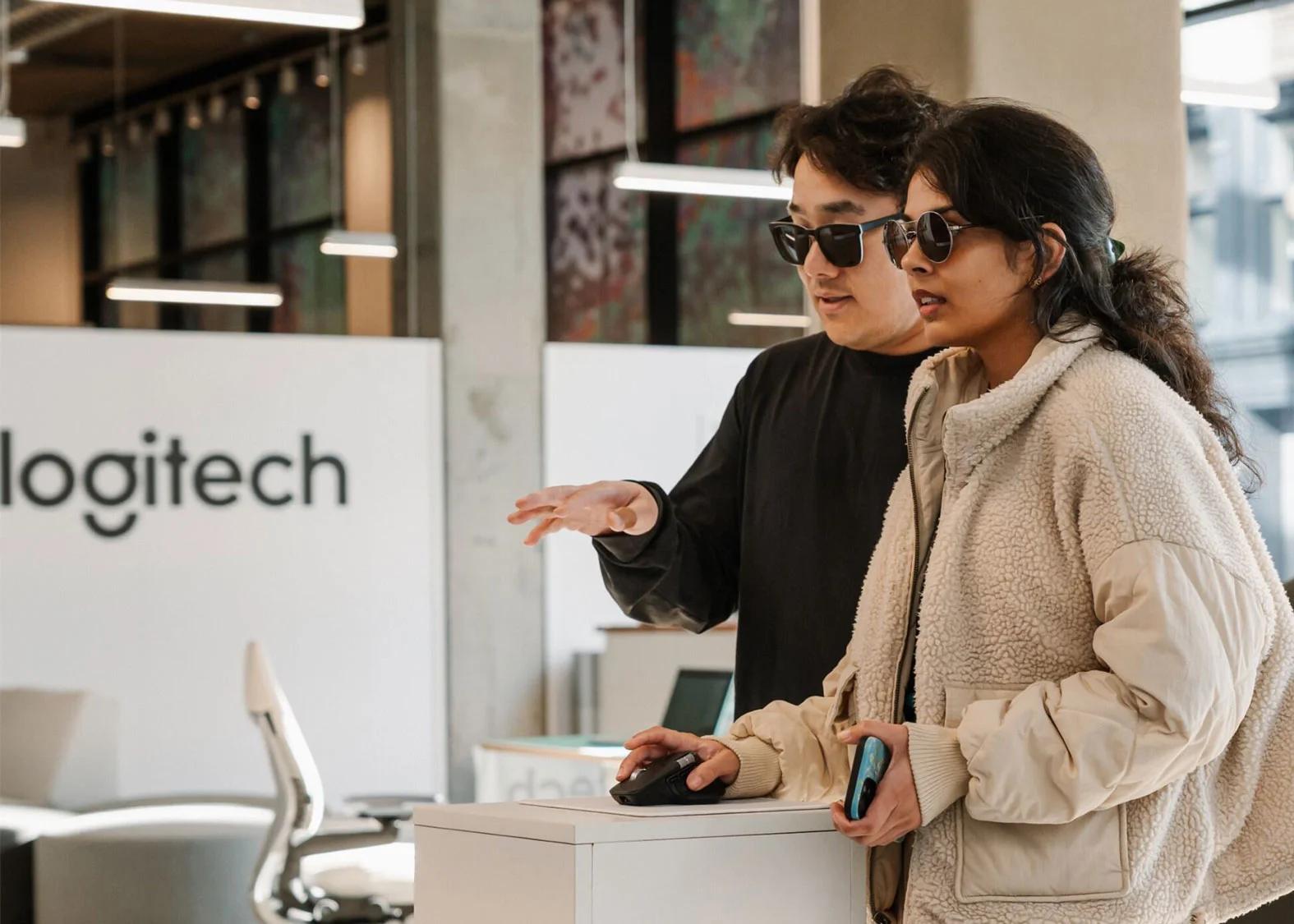 people at a logitech store