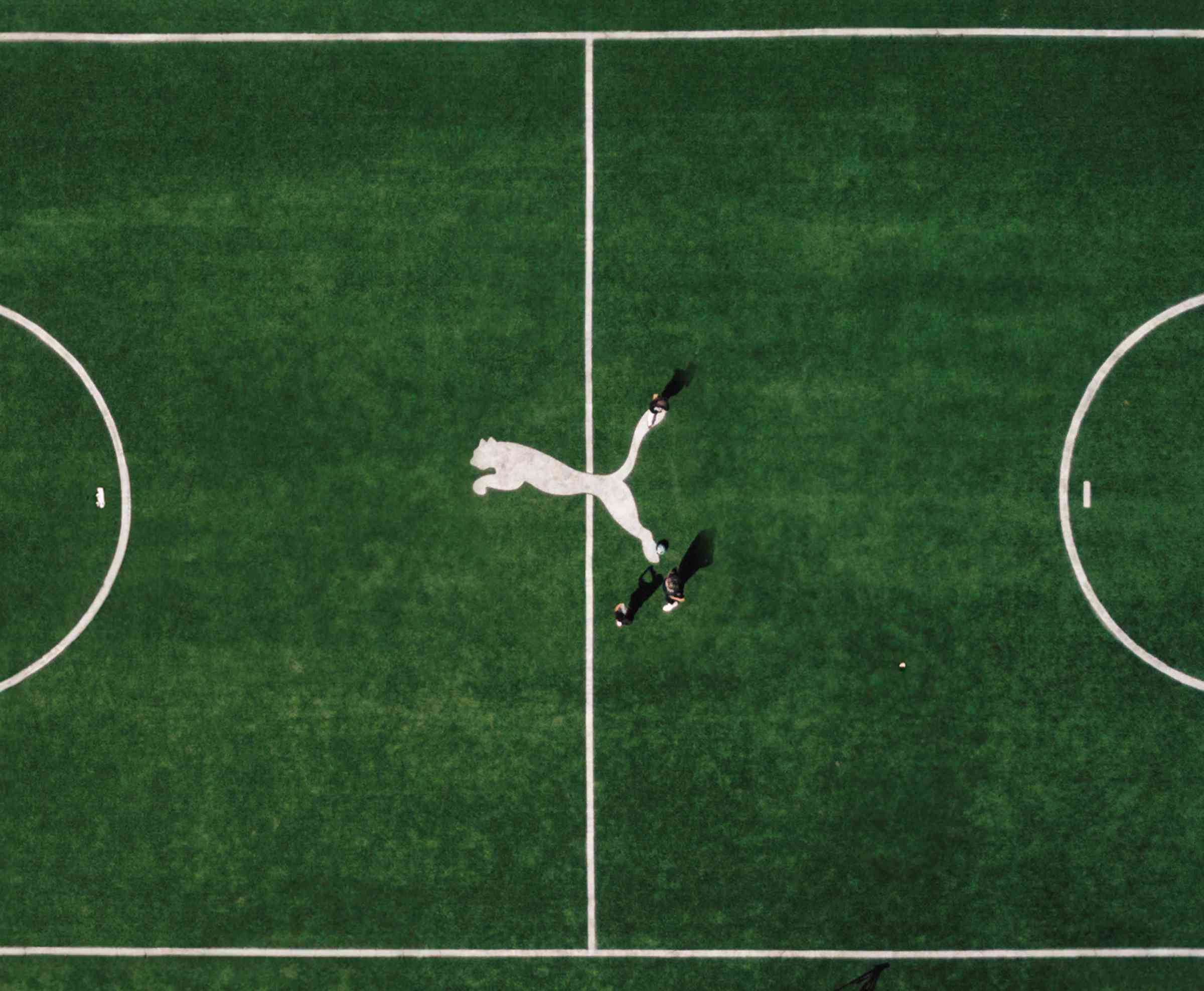 Arial view of a soccer pitch at Mid field with PUMA Cat logo