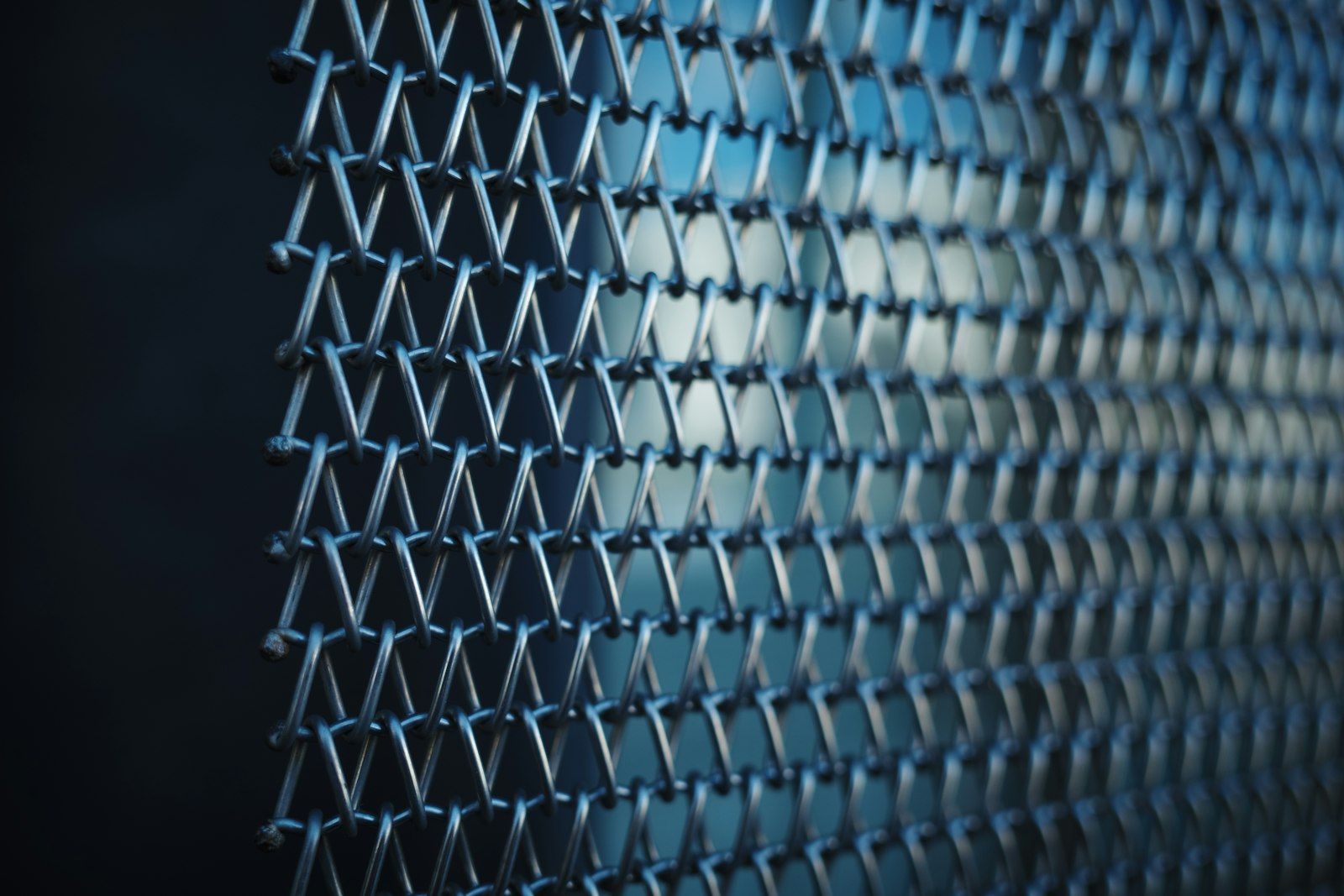 Close-up of a metallic woven mesh pattern