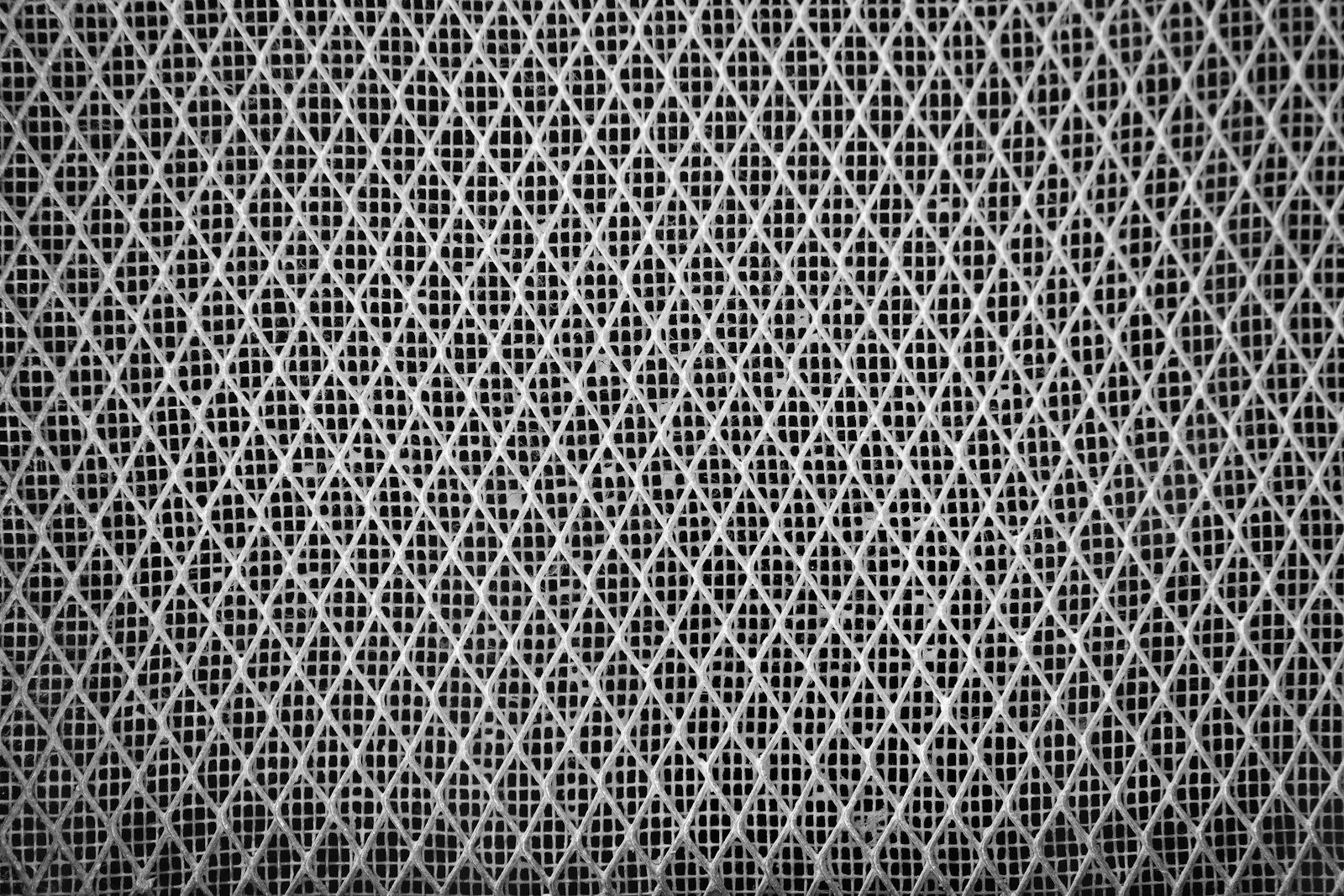 Gray mesh fabric with a diamond pattern texture