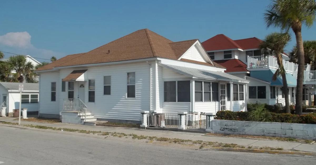 Homes on a street in the Pass-a-Grille Historic District of St. Pete Beach, Florida