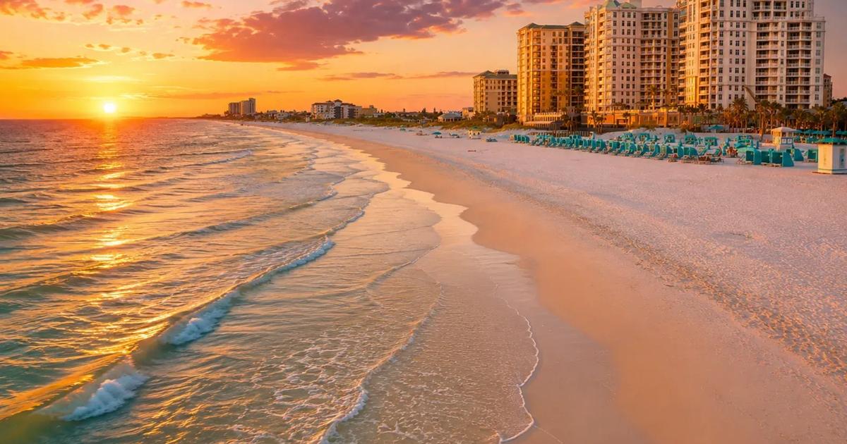 Clearwater Beach at sunset with 2026 short-term rental guide title