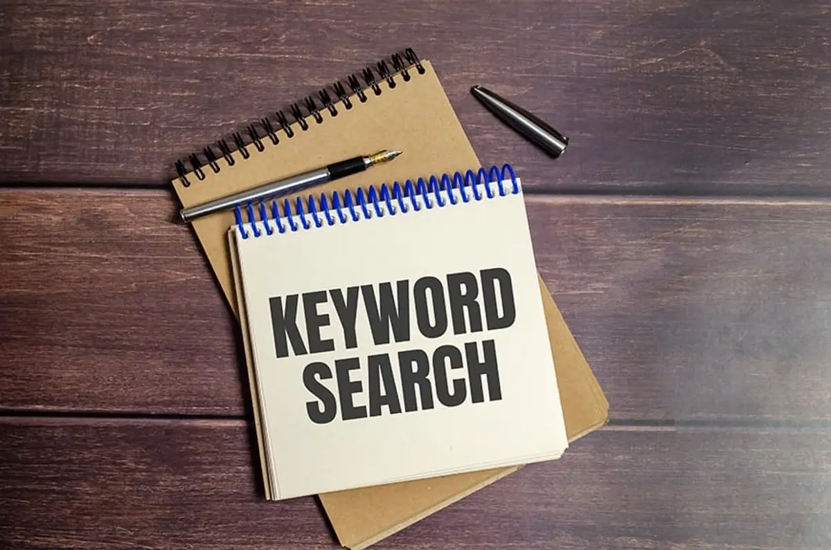 keyword search words notebook wooden background