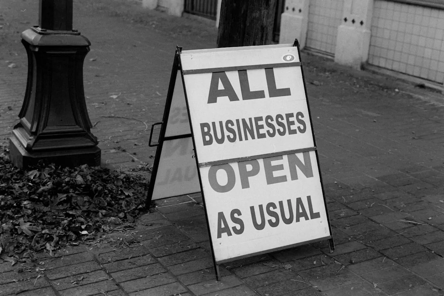 Local high street businesses with open signs, representing small business promotion