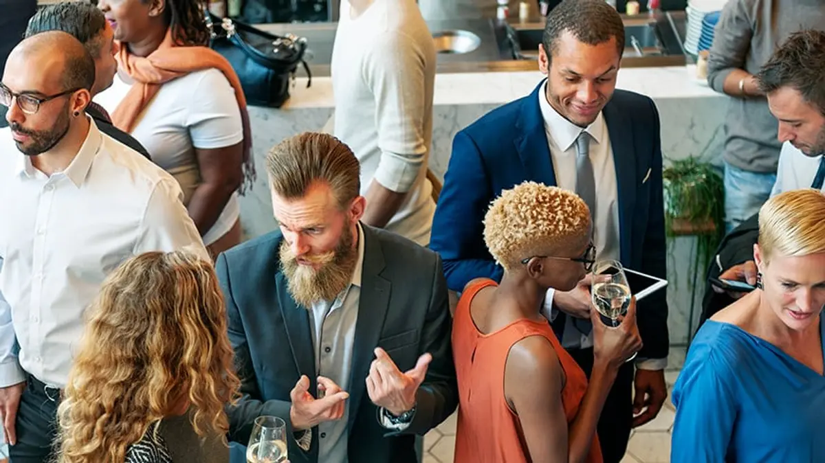 group of people attending a local business networking event