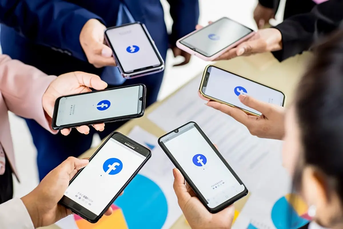 an image with a group of people using facebook