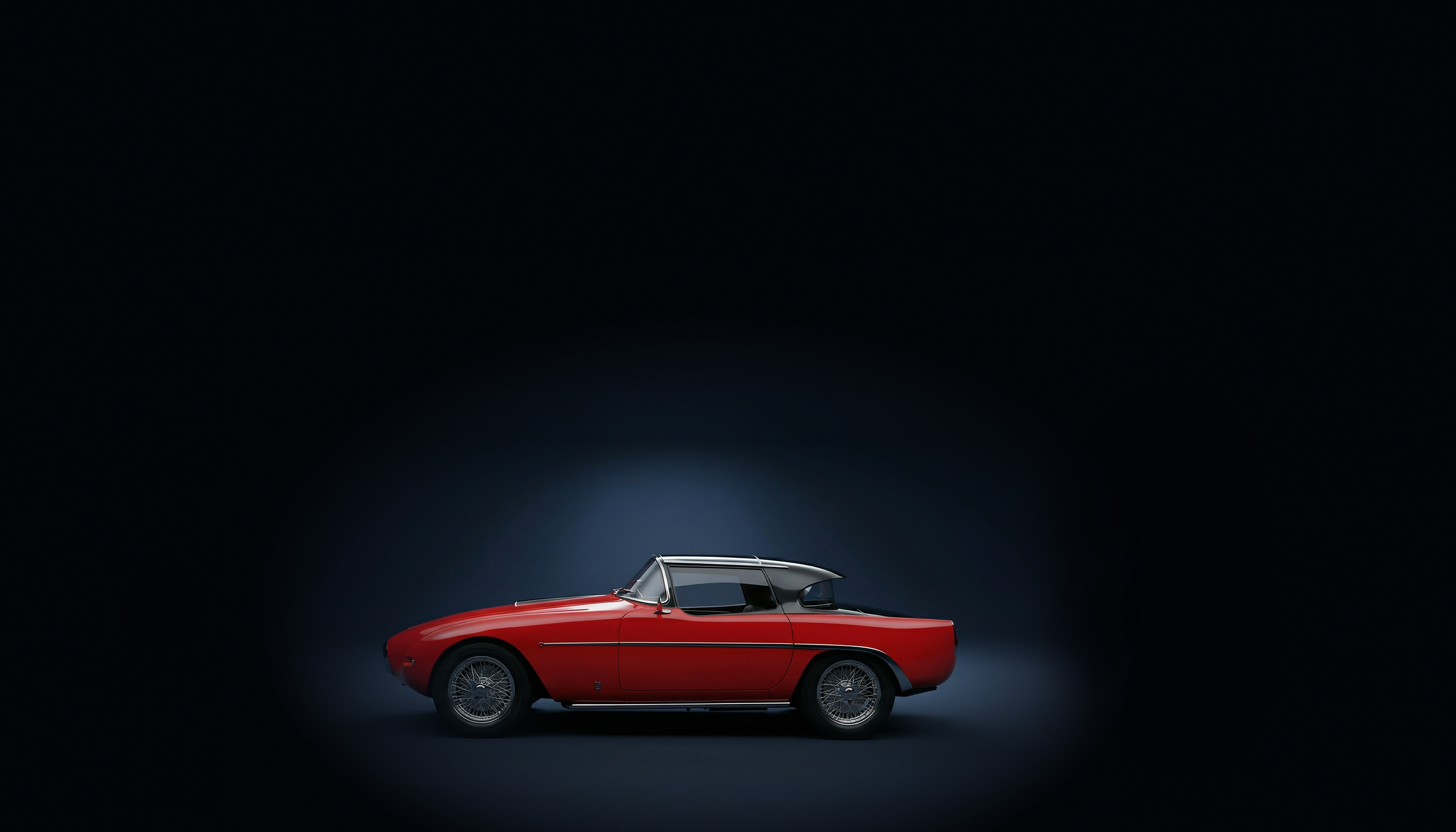 Zijaanzicht van donkerrode Fiat 8v in een donkerblauwe studio