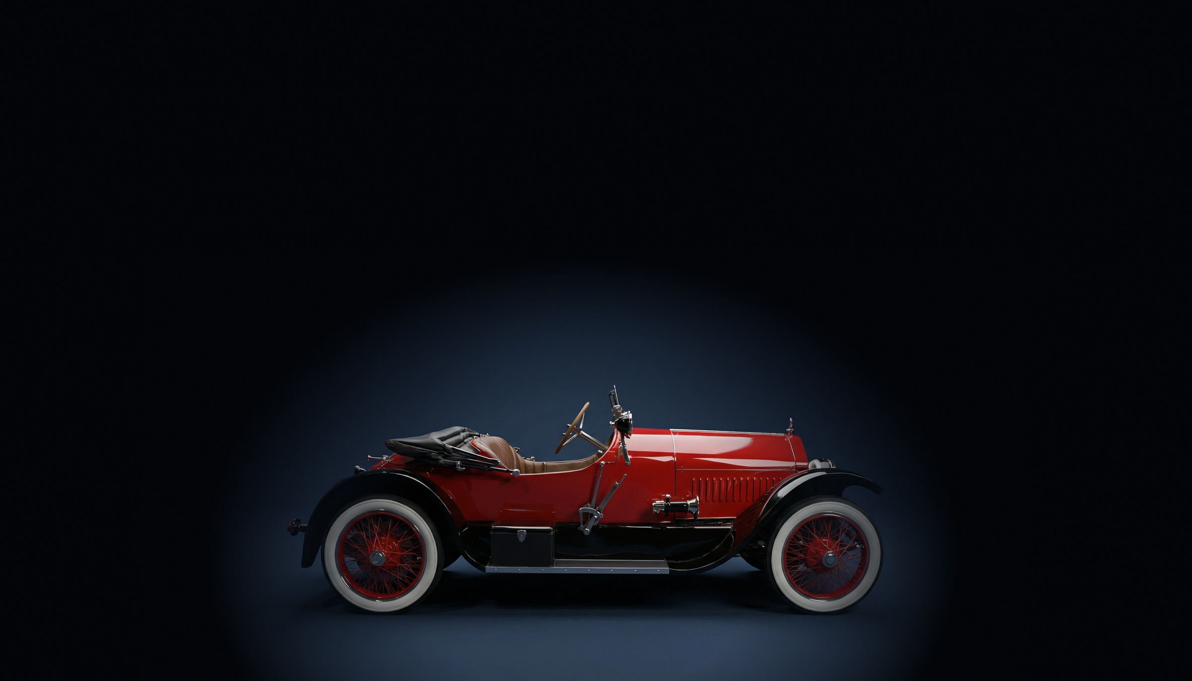 Zijaanzicht Stutz Bearcat in donkerblauwe studio
