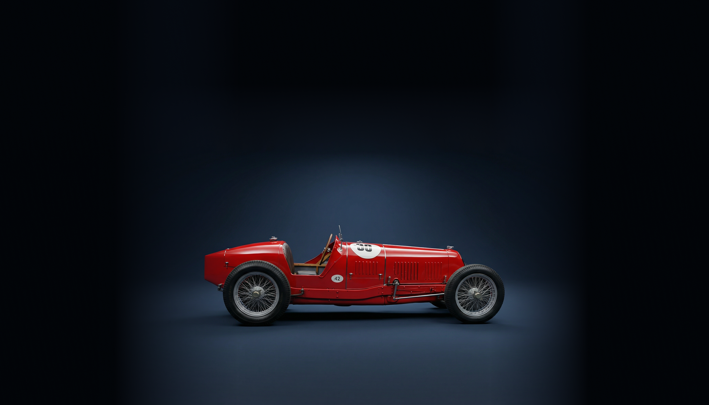 Rode Maserati in donkerblauwe studio