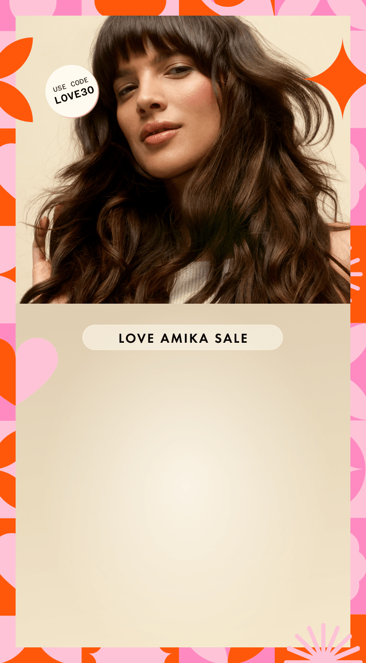 a model with brown, wavy hair stands in front of a cream background. a pink and orange pattern creates a border. stickers read "love amika sale", and "use code LOVE30"