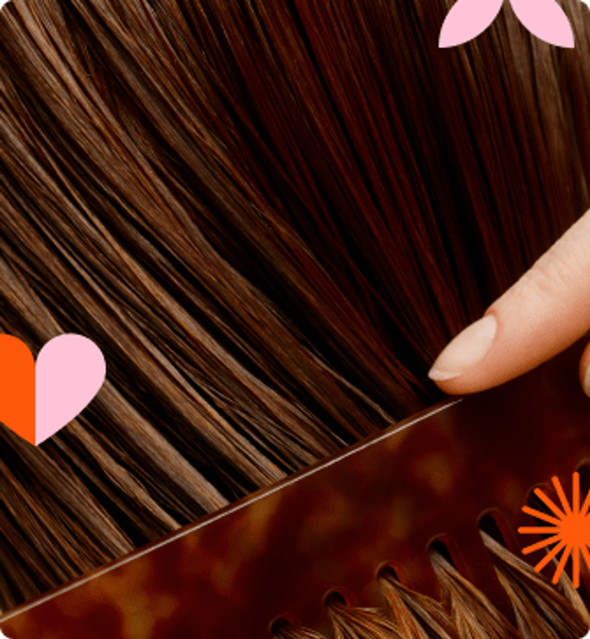 a person's hand runs a comb through brown hair