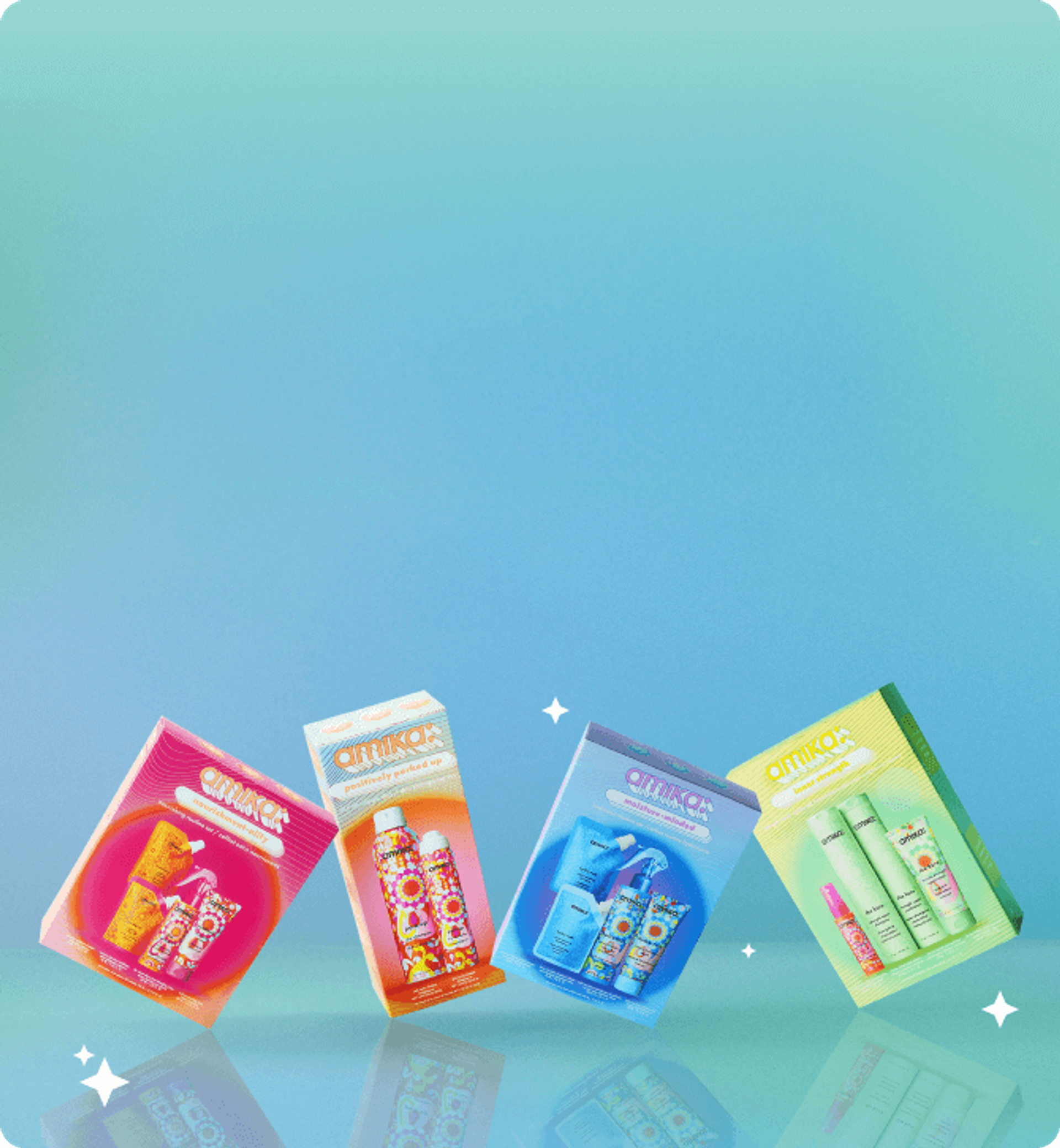 an assortment of amika holiday sets against an aqua background