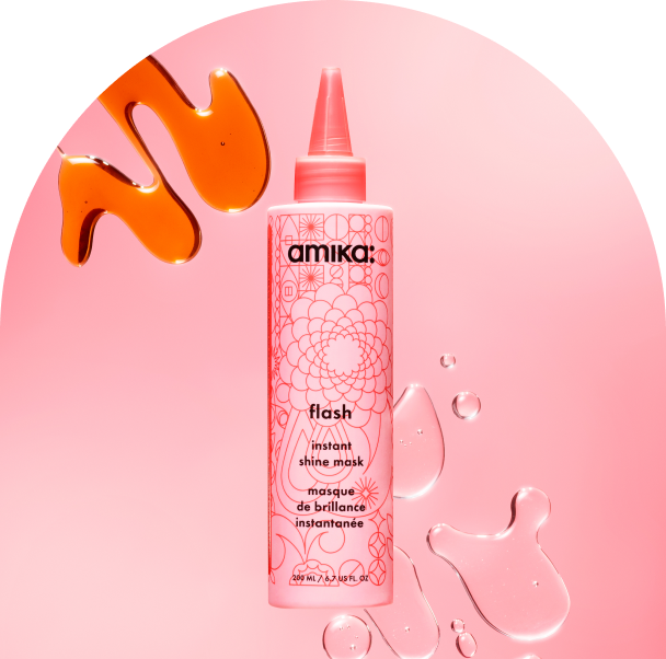 bottle of amika flash instant shine mask against a pink background